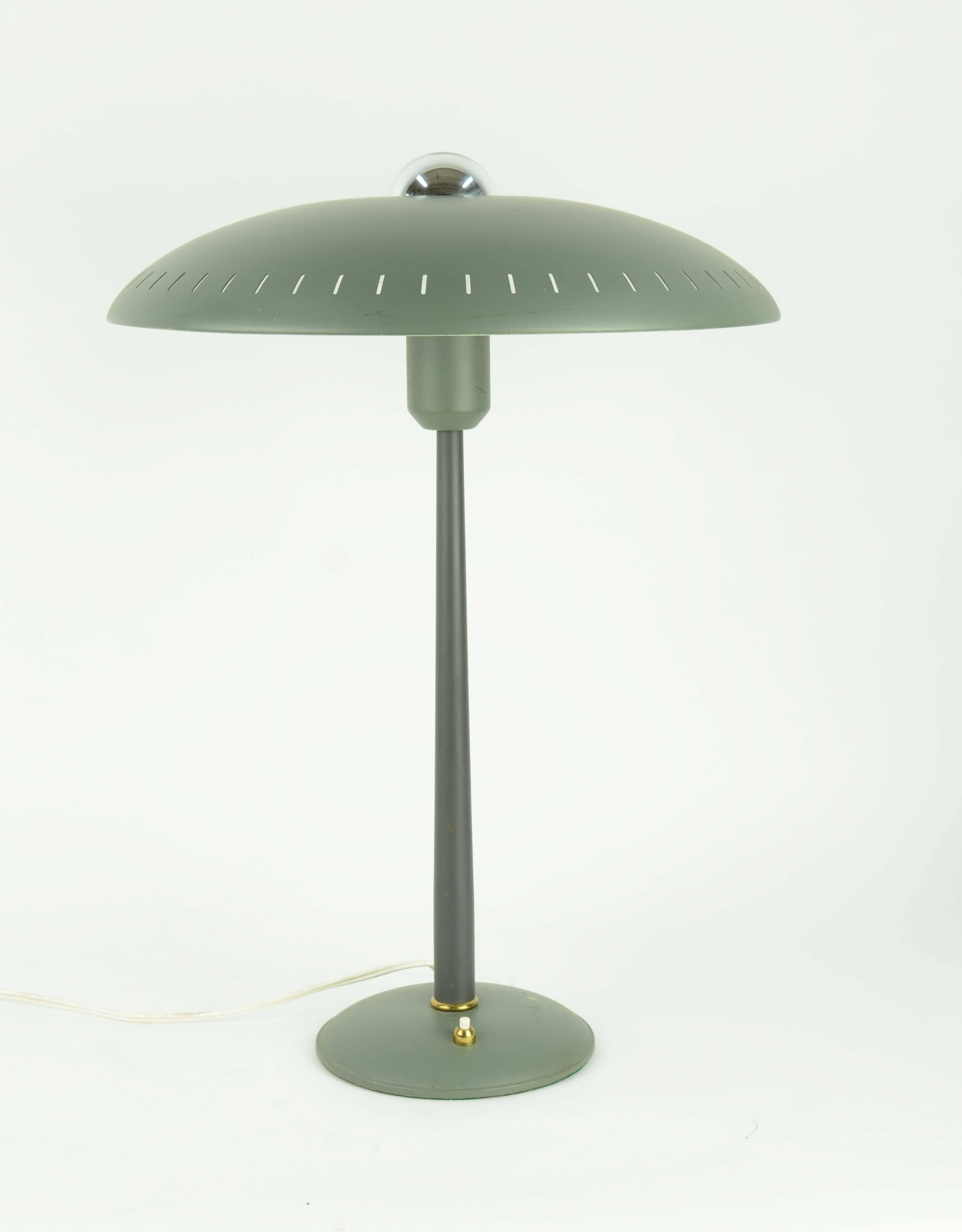 A Louis Kaiff UFO table lamp in green for Phillips.
