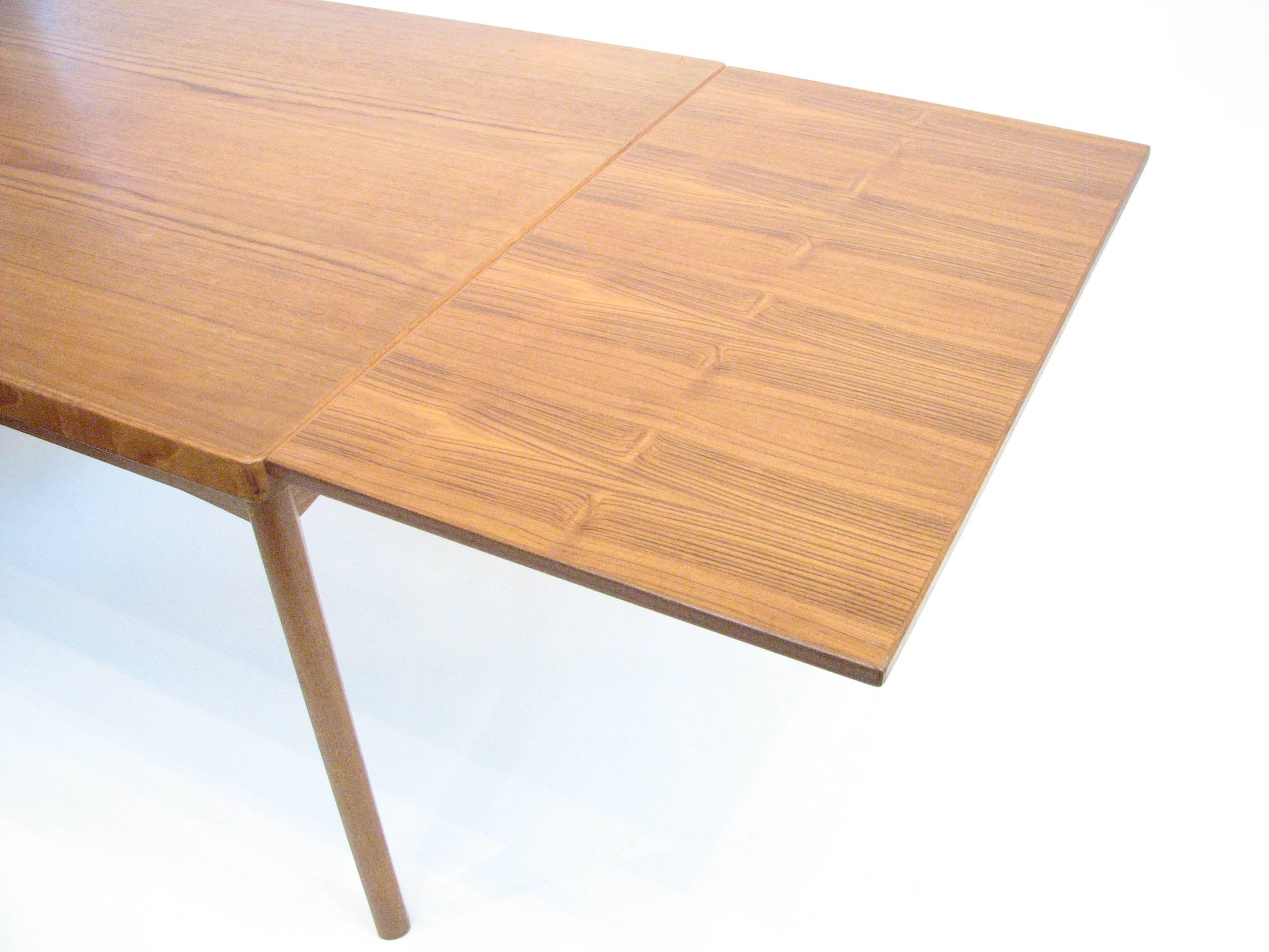 Mid-20th Century Midcentury Danish Teak Dining Table with Pull-Out Leaves by Henning Kjærnulf