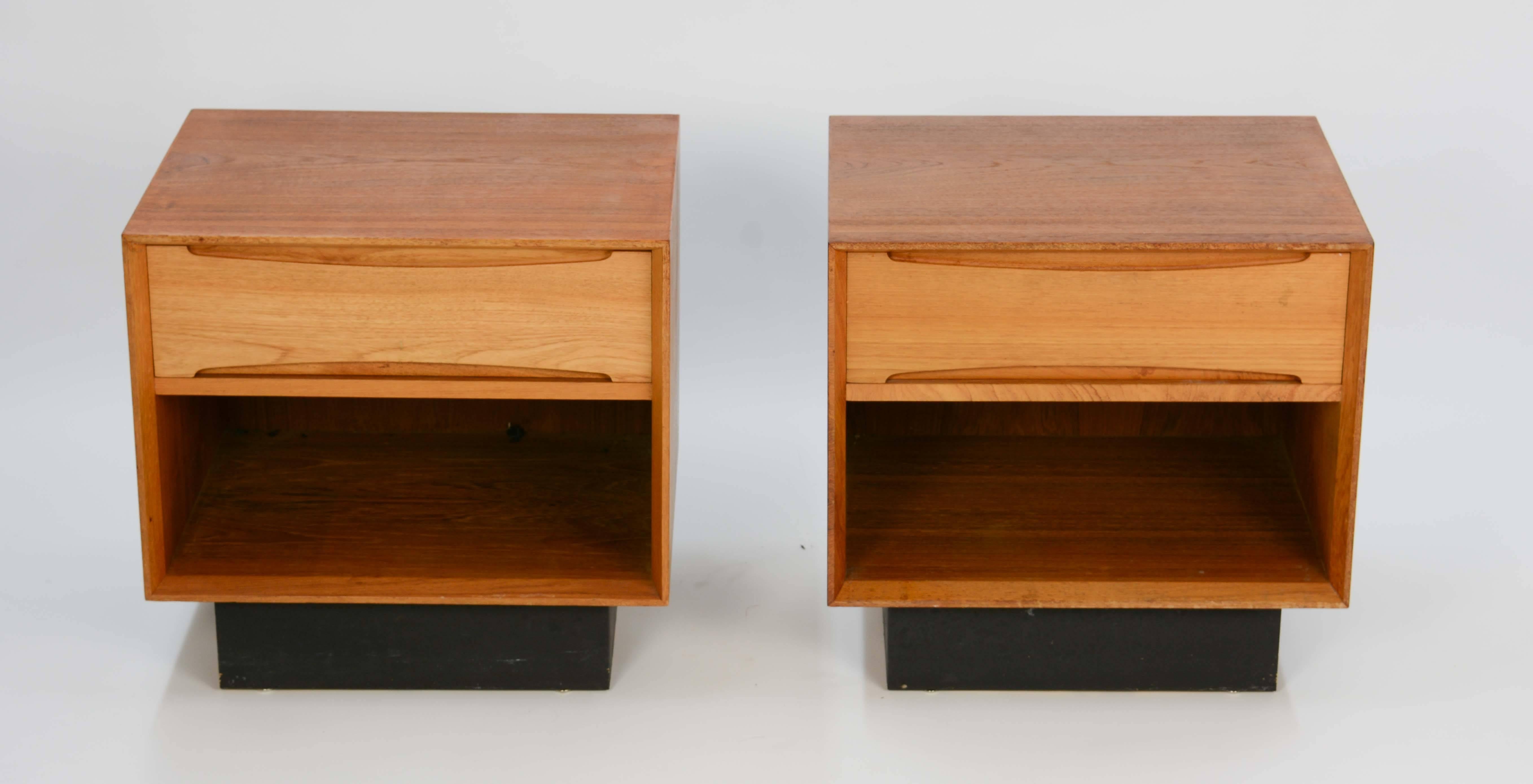 A wonderful pair of Drylund nightstands from Denmark. They are free floating pieces because the backs are finished.