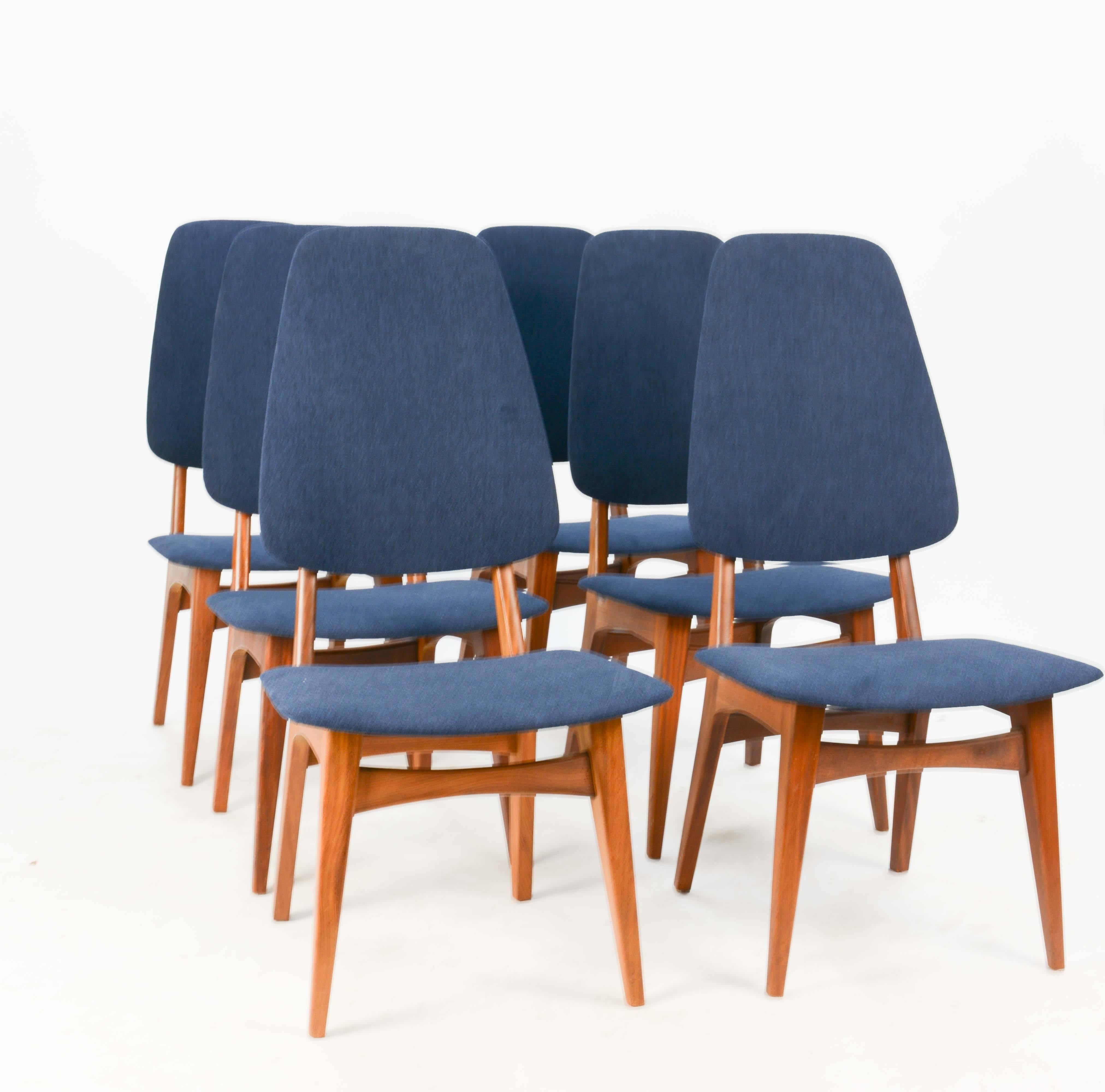 A set of six Sorheim Bruk's Afromosia high back dining chairs of Norway. The frames are in walnut and the seats and back have freshly been done in a Royal blue suede. These are very comfortable chairs and we have ten in total if needed. Measures: