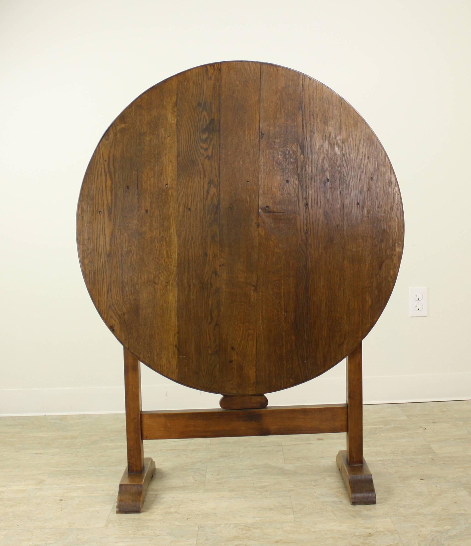 This wine tasting table, also known a vendange table in the vineyards of France, is a charming example, as it is quite small, and could be utilized as an end table or a smaller breakfast table. It would be a lovely center hall table also. As is