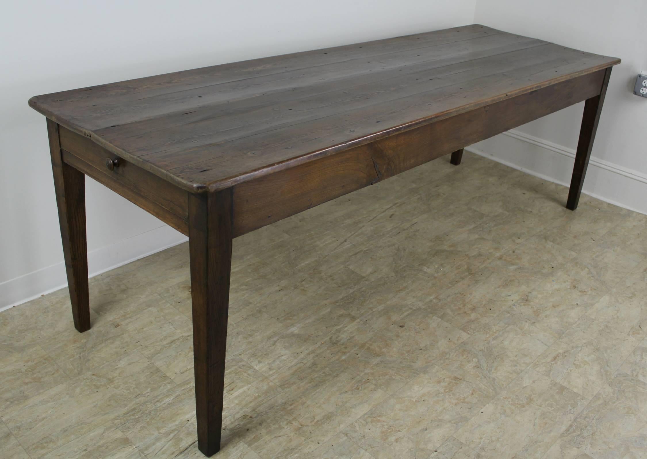 We love the generous proportions of this French farm table! With 91.5 inches between the legs on the long side, this piece can easily seat ten. Good grain, color and patina, with a deep elegant apron, which at almost 25 inches, is very comfortable