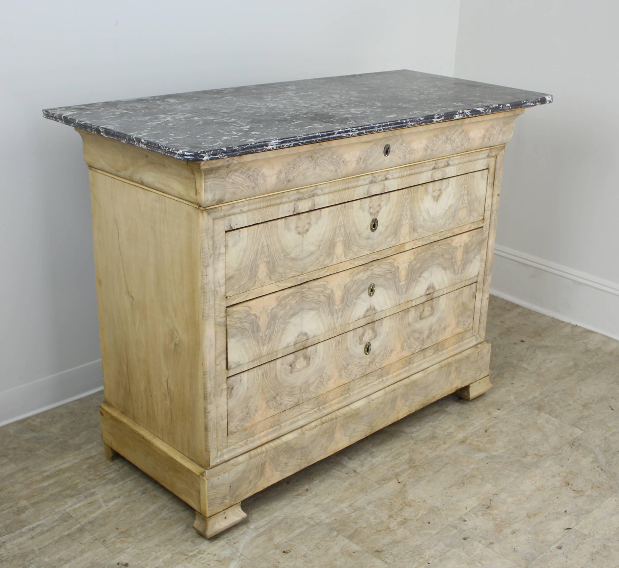 Bleached walnut burl veneer is a popular trend on the rise in French and English decorating. We are starting to see a similar bureau in fine decorative shops on our buying trips. The walnut veneer has dramatic grain which bleaches to a muted
