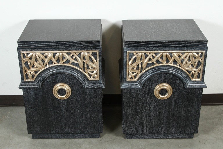 Exquisite pair of end cabinets by James Mont. 
The cabinets have been totally restored, finished in a dark cerused oak.
They are also trimmed with carved bamboo which has a glazed silver leaf finish.