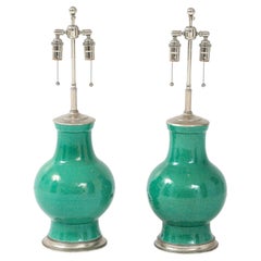 1940's Pair of Large Ceramic Lamps With A Stunning Emerald Green Glaze.