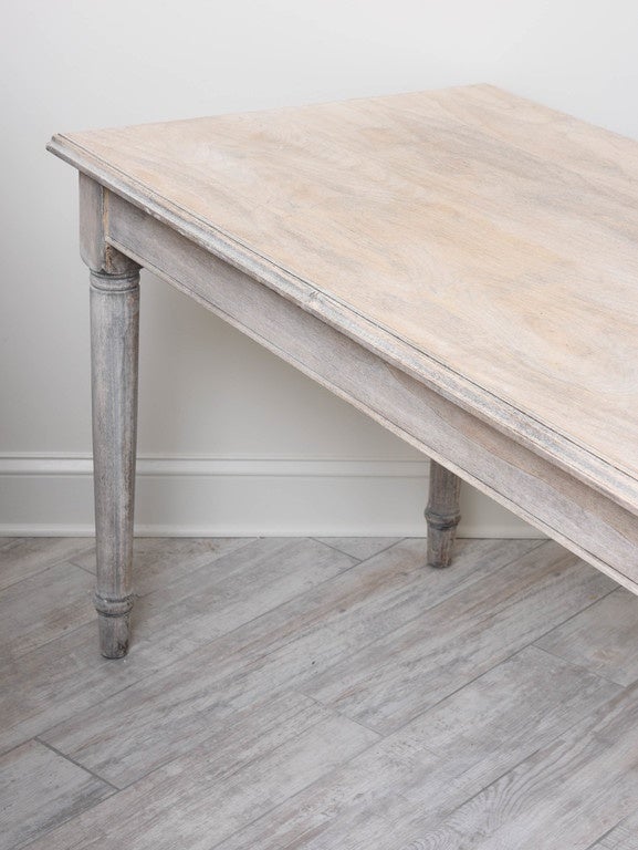 Handsome bleached wood country French farm table. Ideal for dining, console or center table.