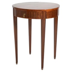 Table à pied rond en marqueterie, XIXe siècle.