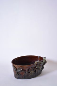 Brown and green low relief ceramic planter, 1950s.