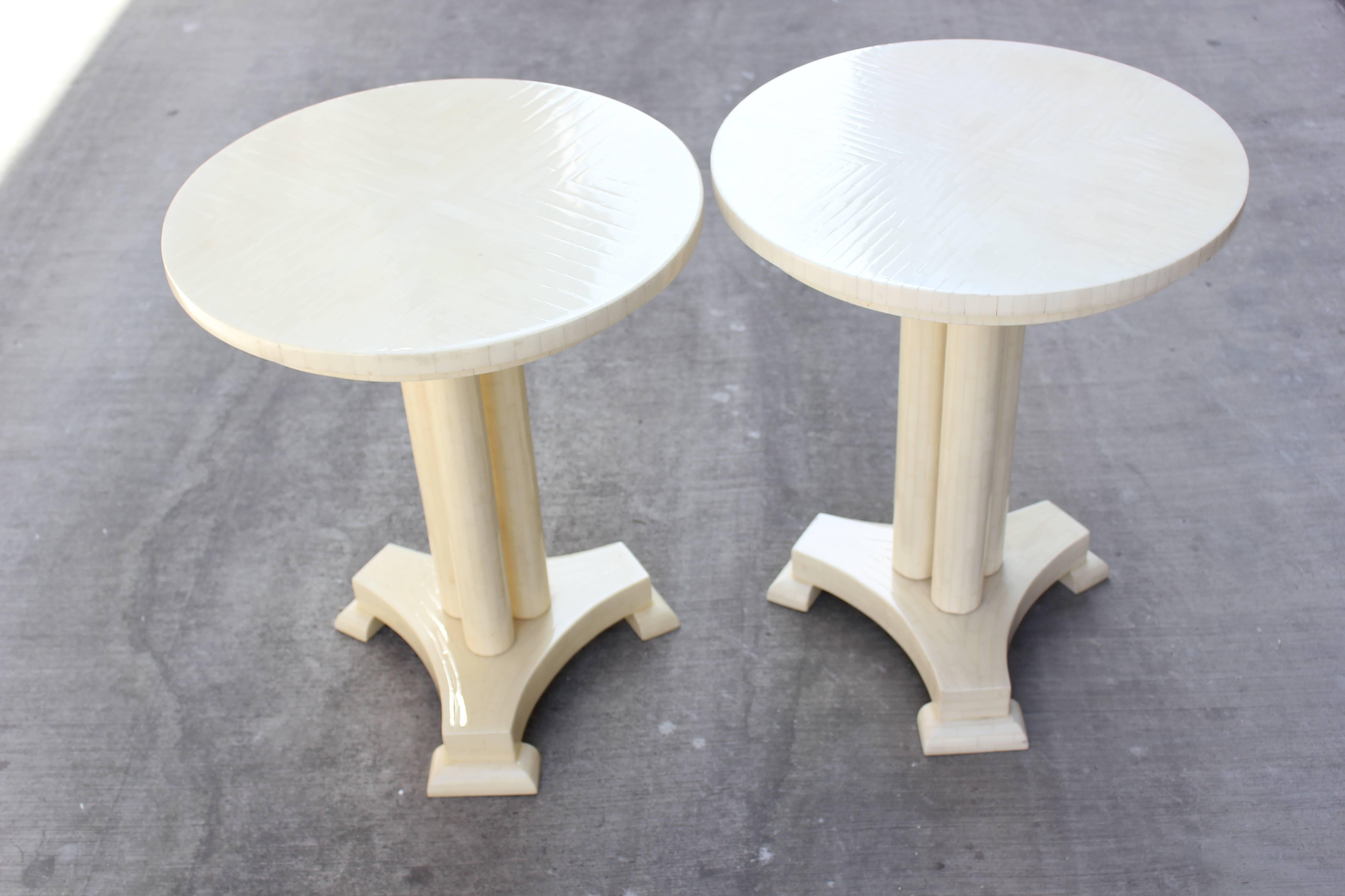 Pair of tesselated bone side tables. Made in Colombia,
1970s. The width of the bone filets are slightly different on the two tables. 
Also one table is slightly darker than the other.