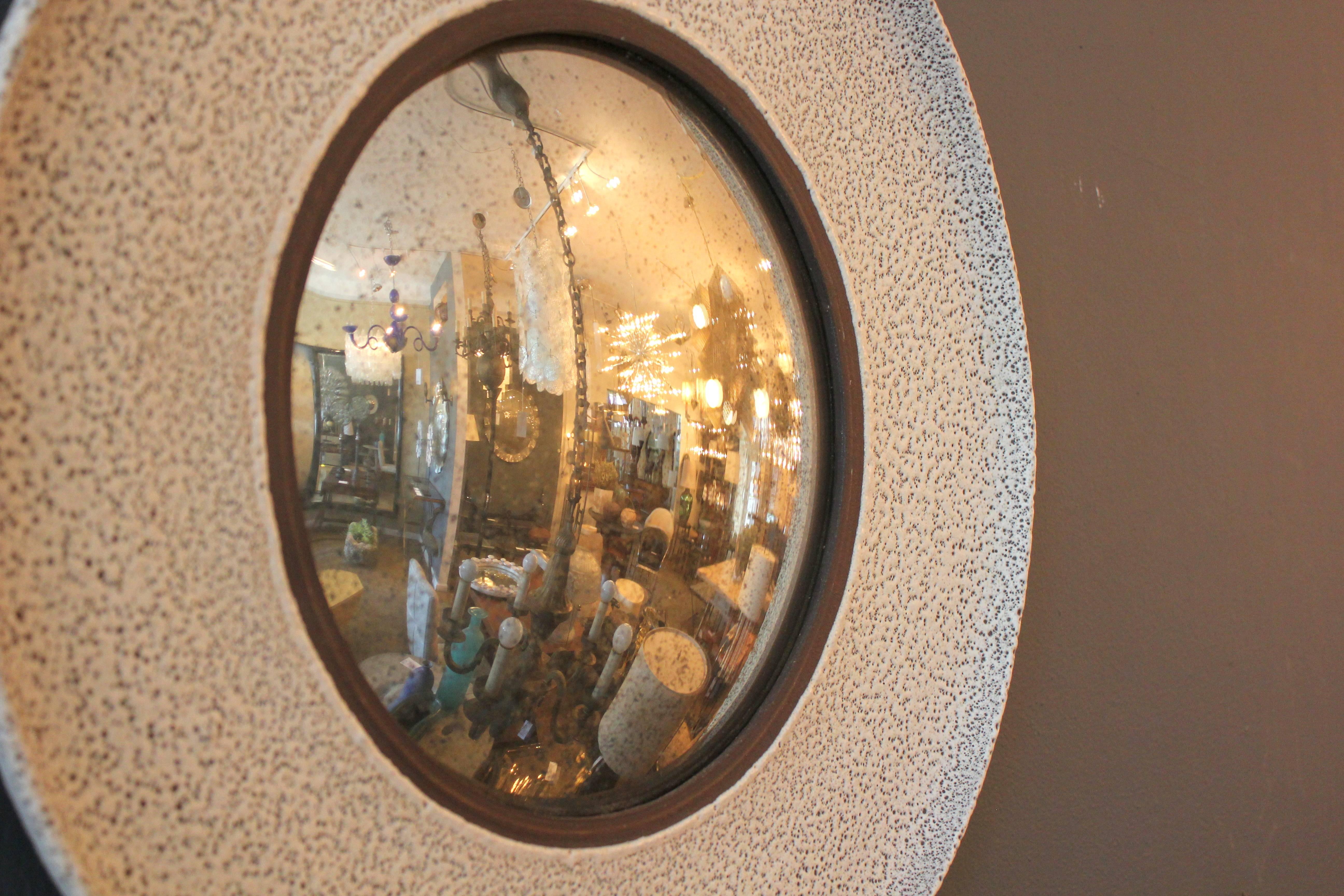 Warner Walcott ceramic convex mirror.