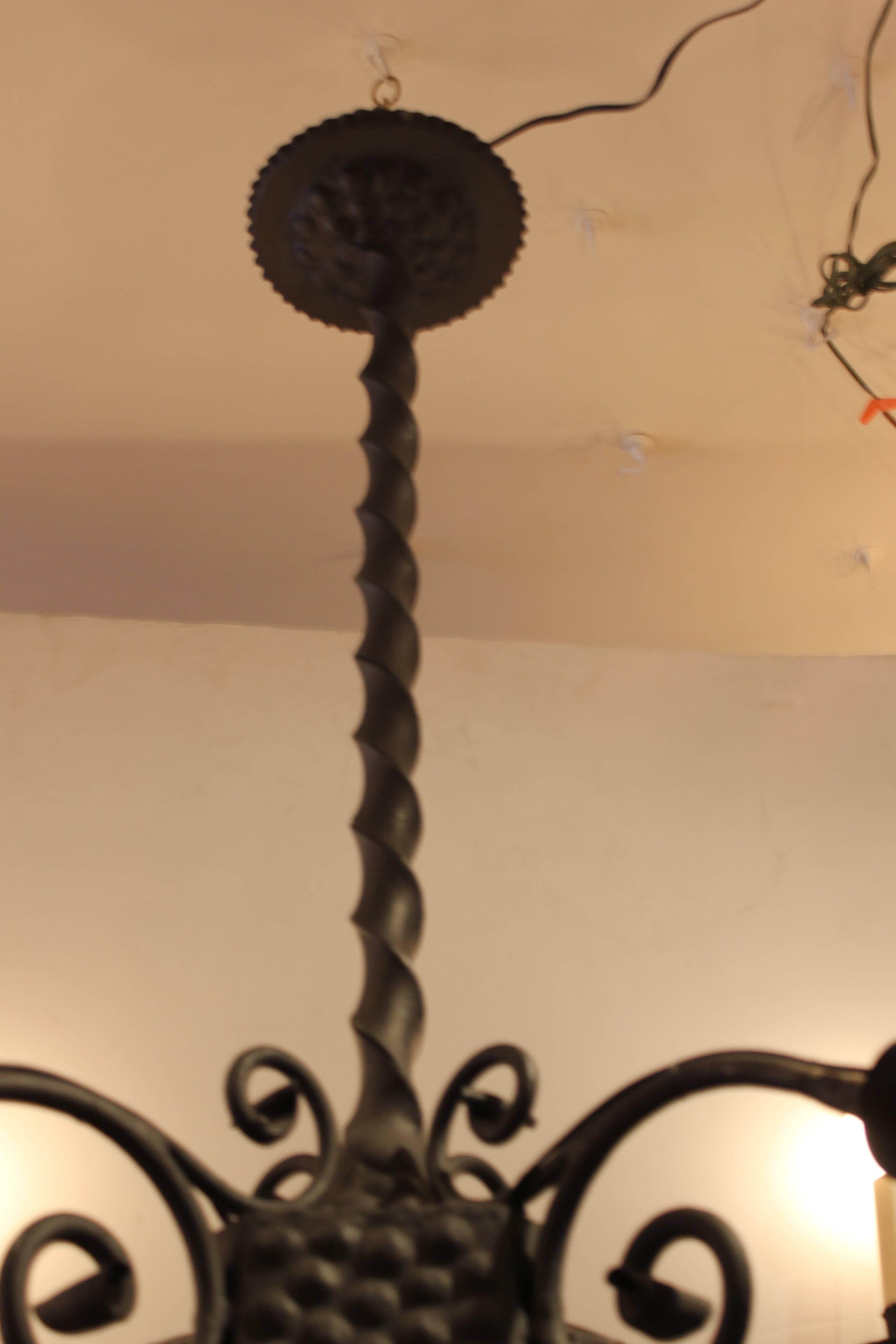 Early 20th century wrought iron chandelier from Spain. 
New wiring.