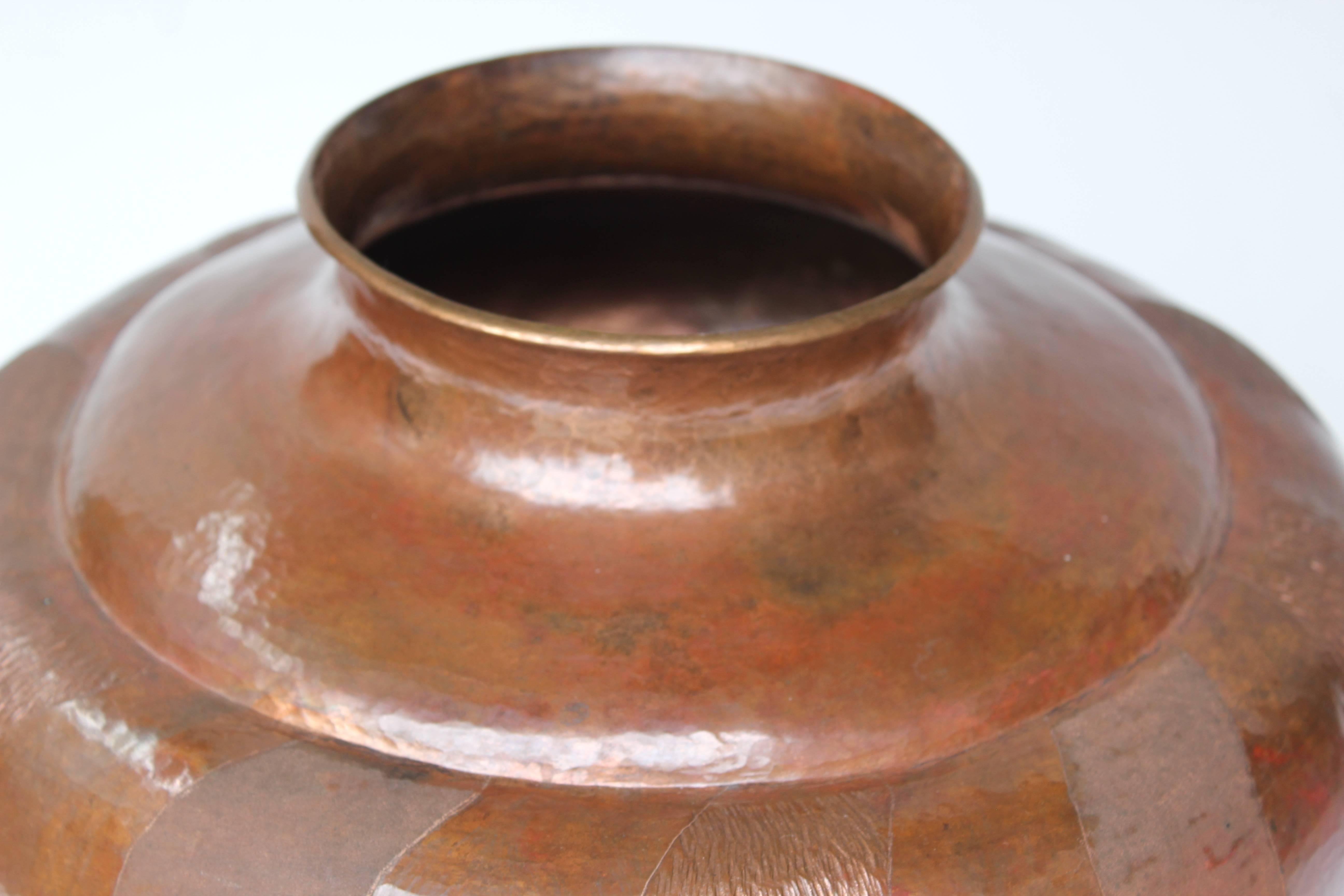 Hand-wrought copper vase from Michoacan Mexico.