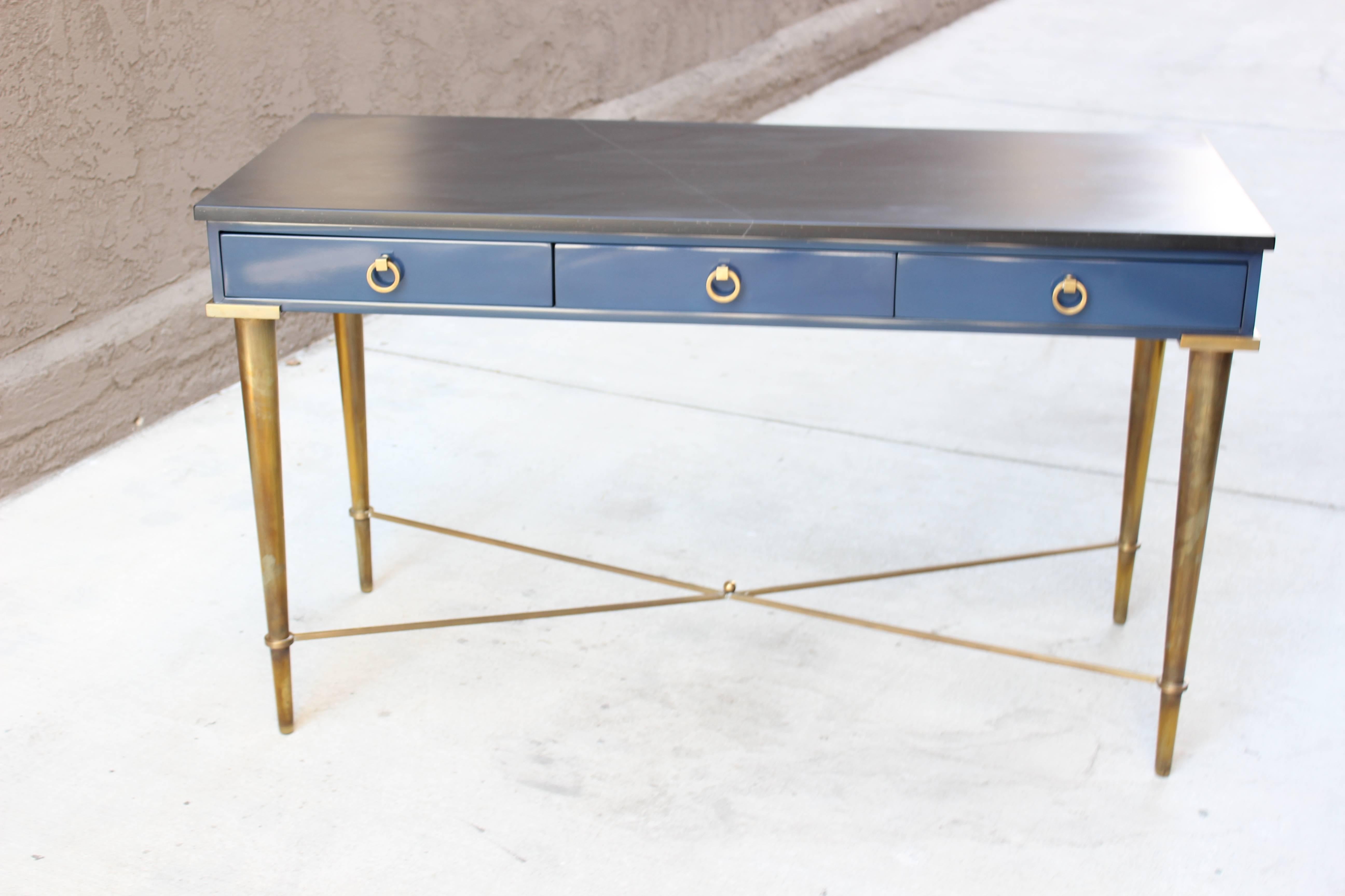 Arturo Pani brass, cadet blue lacquer and slate topped console table with three drawers.