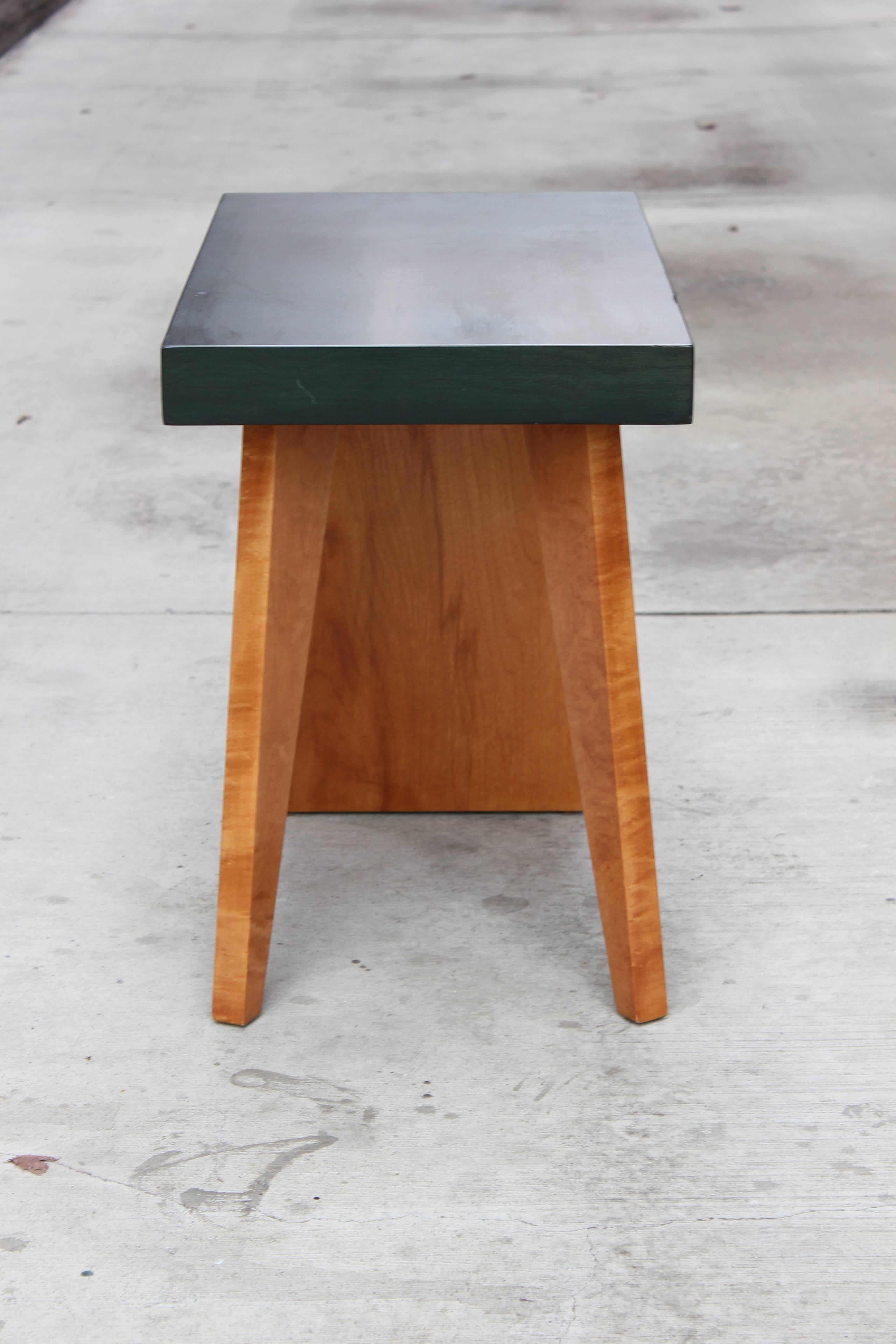 Birch and lacquered green table, circa late 1940s. 

Refinished.