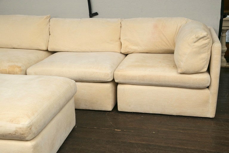 Milo Baughman seven-piece sectional sofa, three corners, three armless, one ottoman. Custom order, 1978. Handmade.
In original fabric. Ready for new upholstery. All foam, batting, and fiber interior are in excellent condition. Hardwood construction