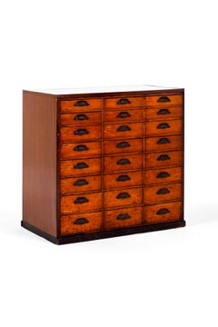A Large English Oak and Pine Bank Of Haberdashery Drawers or Apothecary Drawers