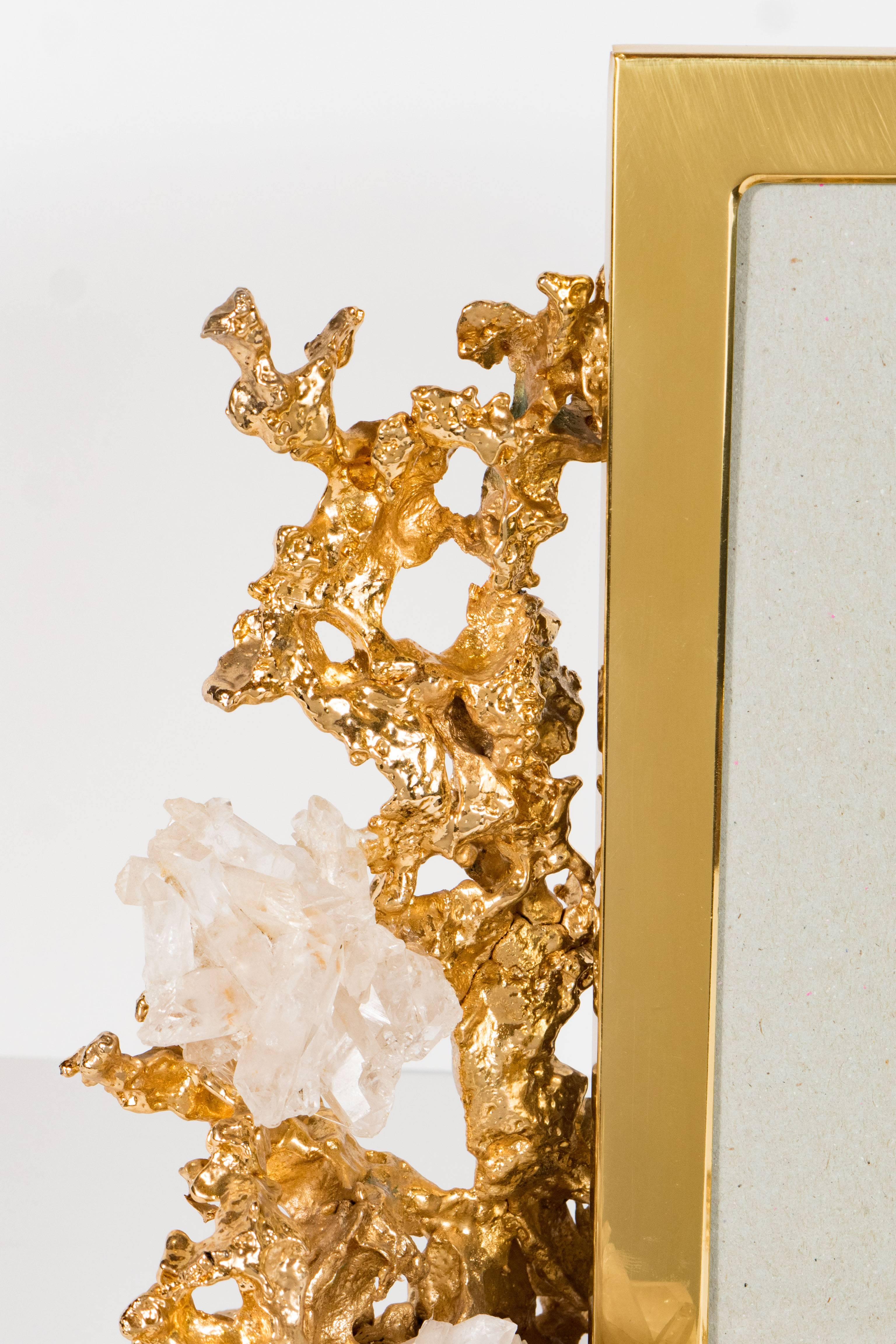 This exquisite coral-form picture frame with stand by Claude Victor Boeltz with natural rock crystal prisms. One of the artists 24-karat gold plated 