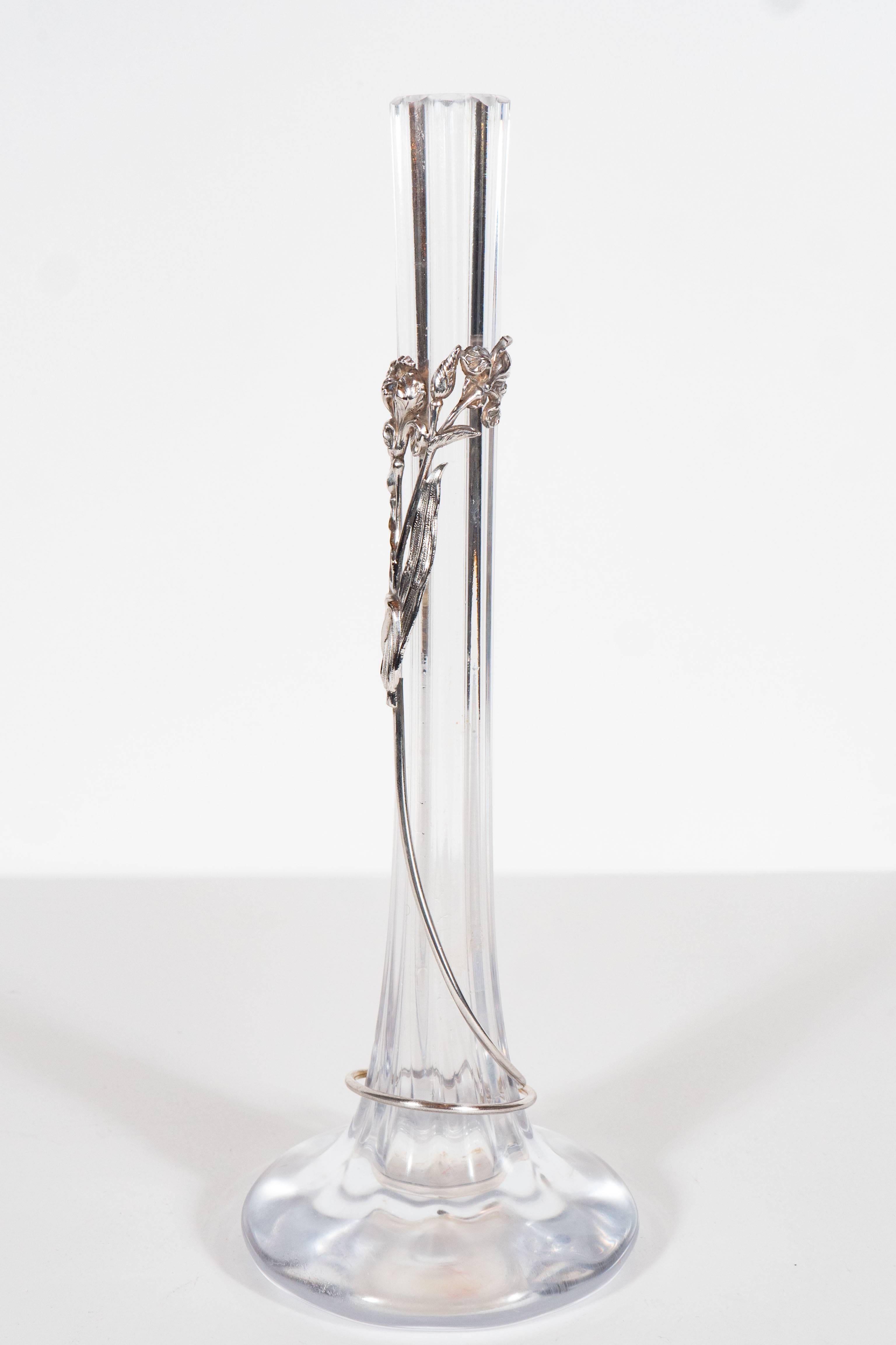 This gorgeous vase features a tapered cylindrical opening into a bulbous bottom. There is a delicate day lily plant in patined sterling silver climbing the neck of the vase. This is a magnificent example of Art Nouveau design at its best, and would