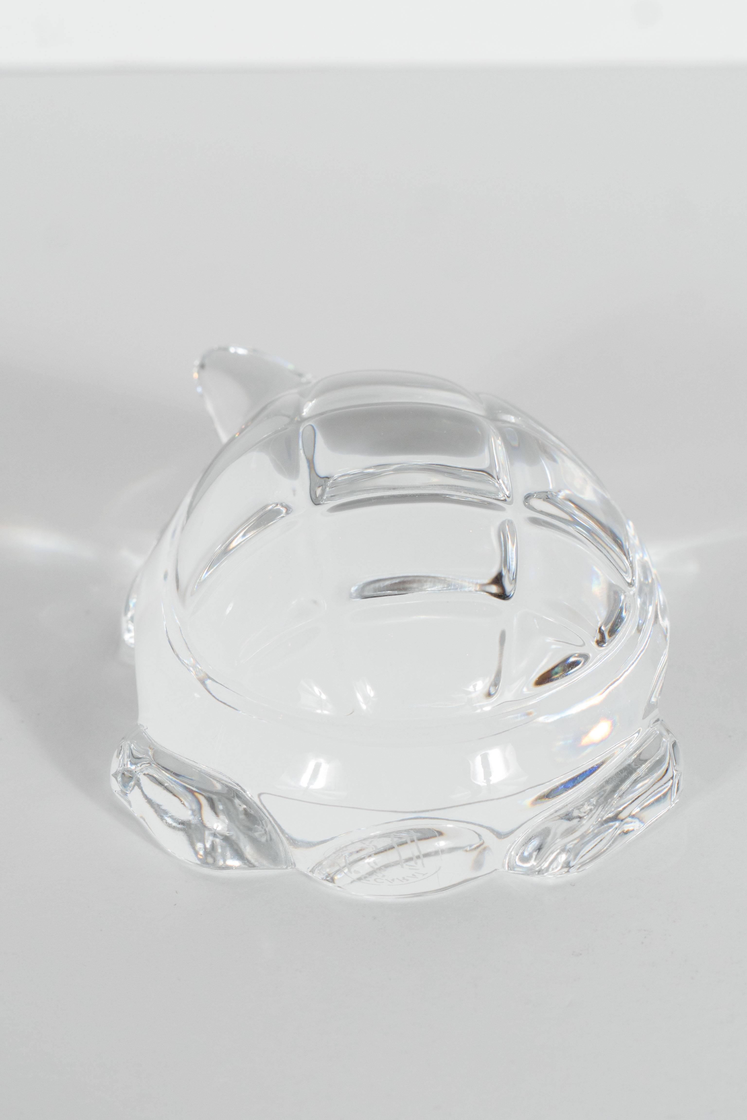 This beautiful retired Baccarat lead crystal figurine/paperweight has been made in the form of a stylized box turtle. The piece has a wonderful chunky appearance with four thick rectangular feet and a rounded shell featuring well defined rectangular