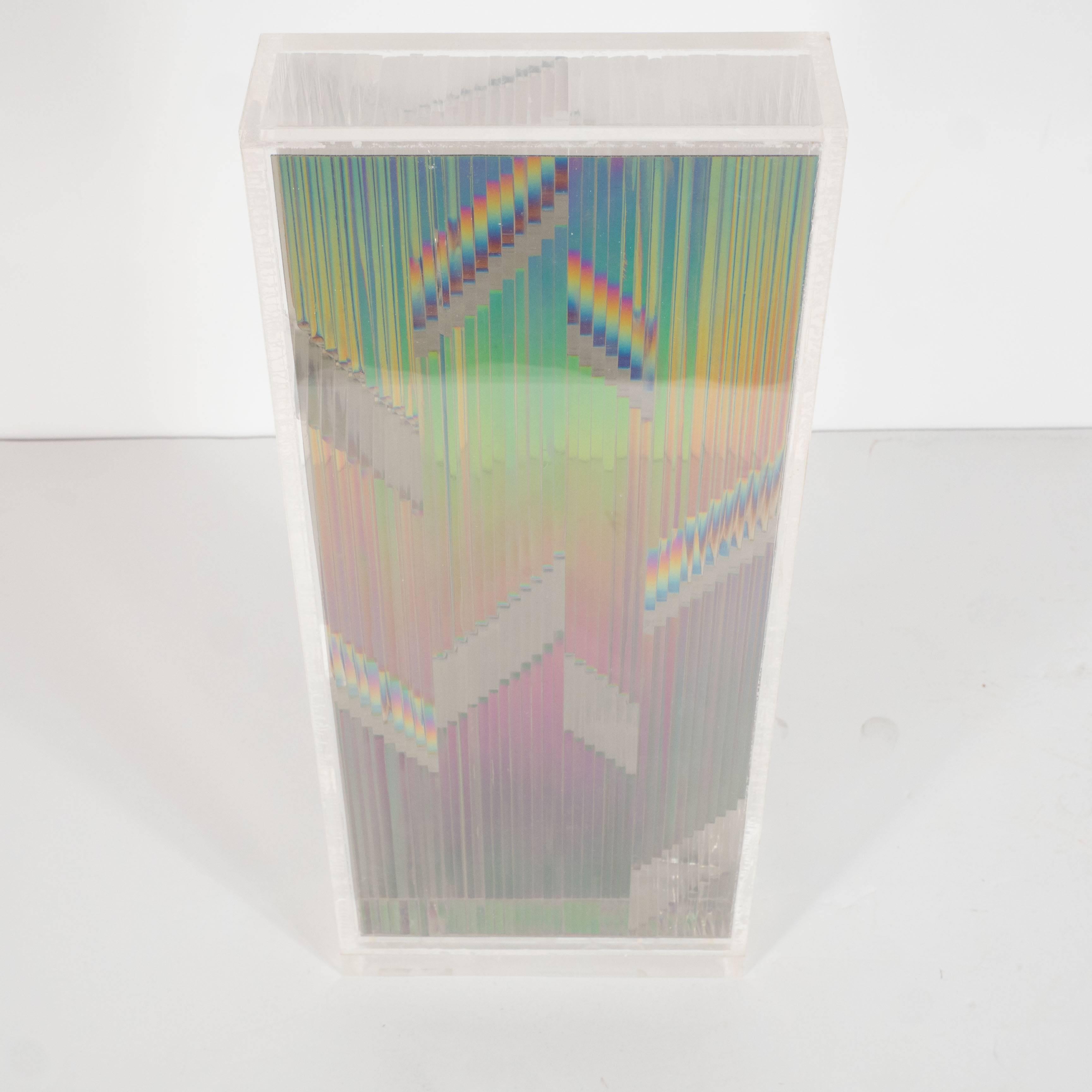 This Mid-Century Modernist sculpture features an Optical art design all executed out of stacked Lucite. It is titled Tower 1 and dated 1968 and inscribed with the signature Rory Mcewen. This would be wonderful in a bookcase or as a stand alone art