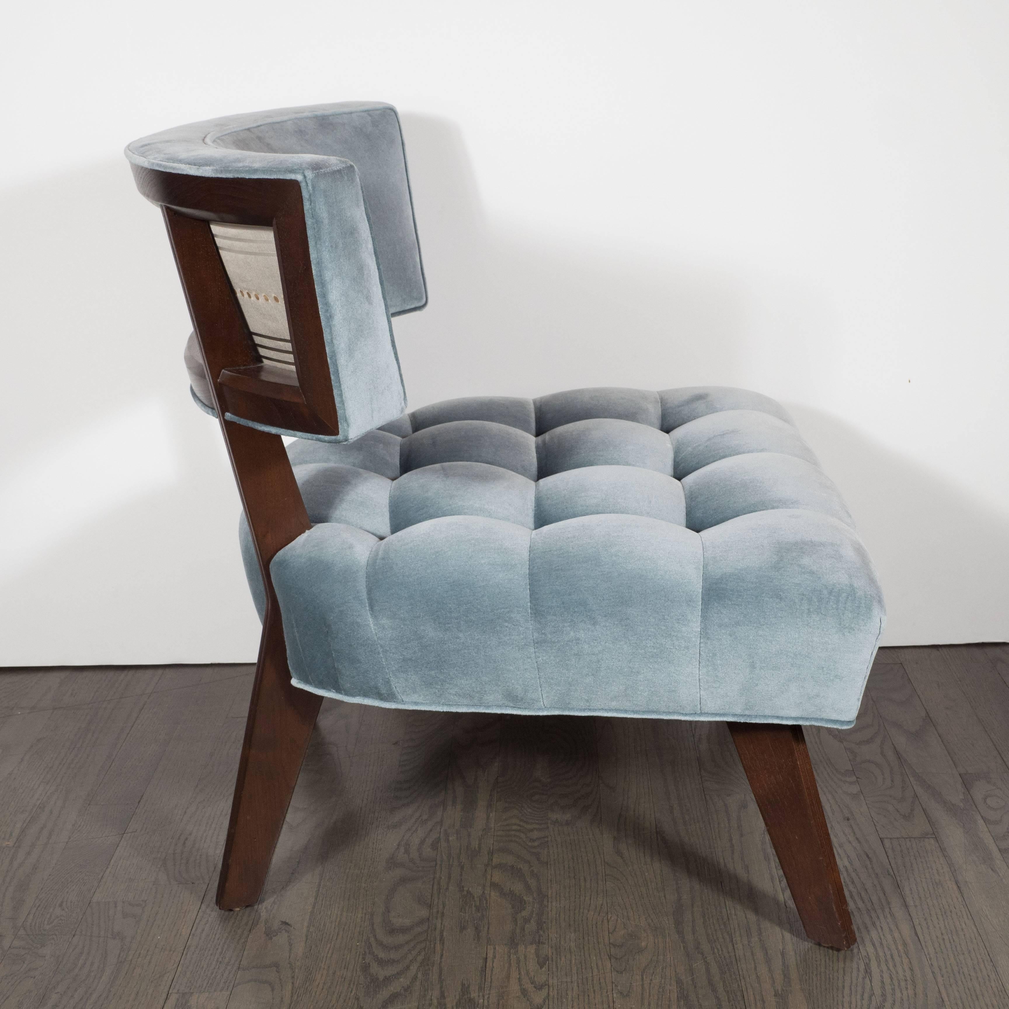 A ultra-chic pair of Mid-Century modernist Klismos chairs by Billy Haines in walnut and blue velvet and silk, attractive button tufted seat cushion is thick and comfortable, resting on 4 slanted dark walnut legs, the backrest in rich blue velvet is
