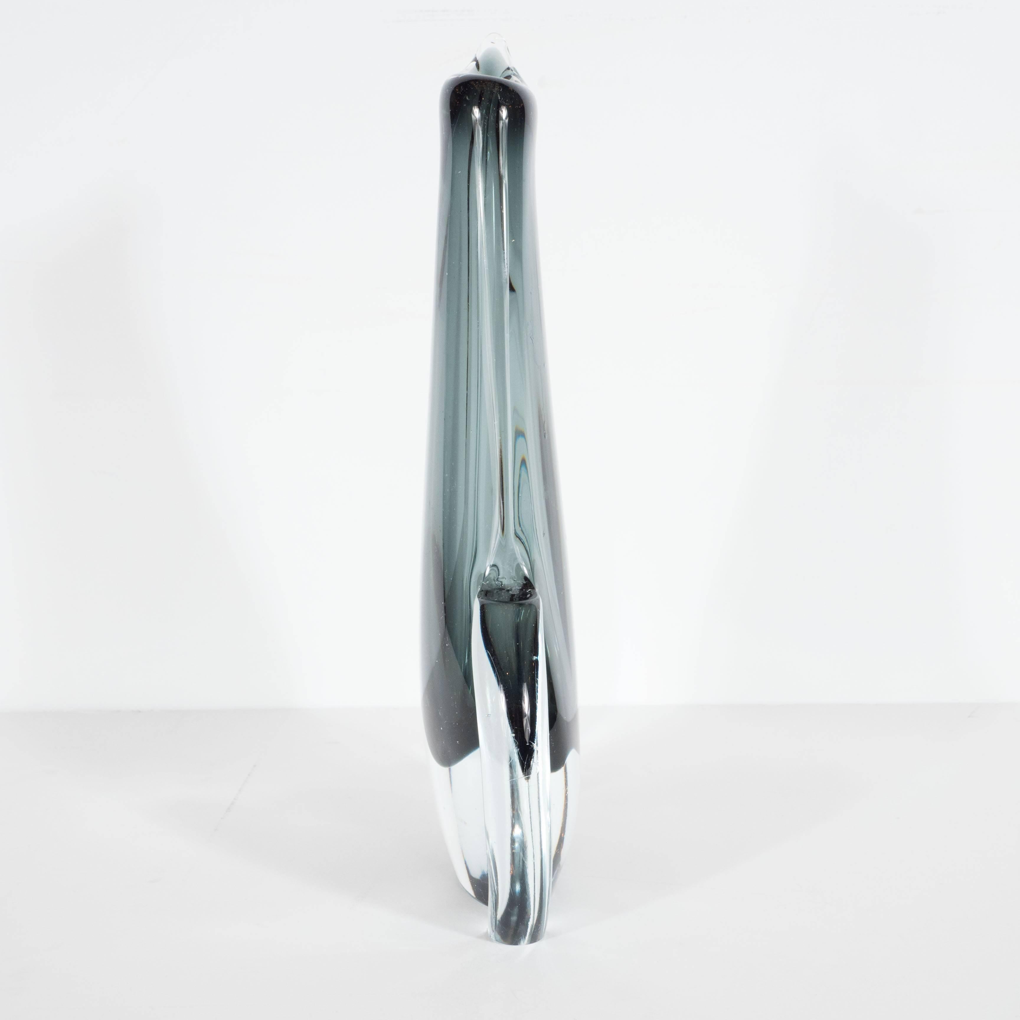 Mid-Century Modern organic teardrop vase by Sommerso Murano, Italy, circa 1960, this striking Sommerso Murano glass vase in handblown glass in an organic shape of a teardrop in grey blue and clear glass.
Italy, circa 1960
Measures: 12.75