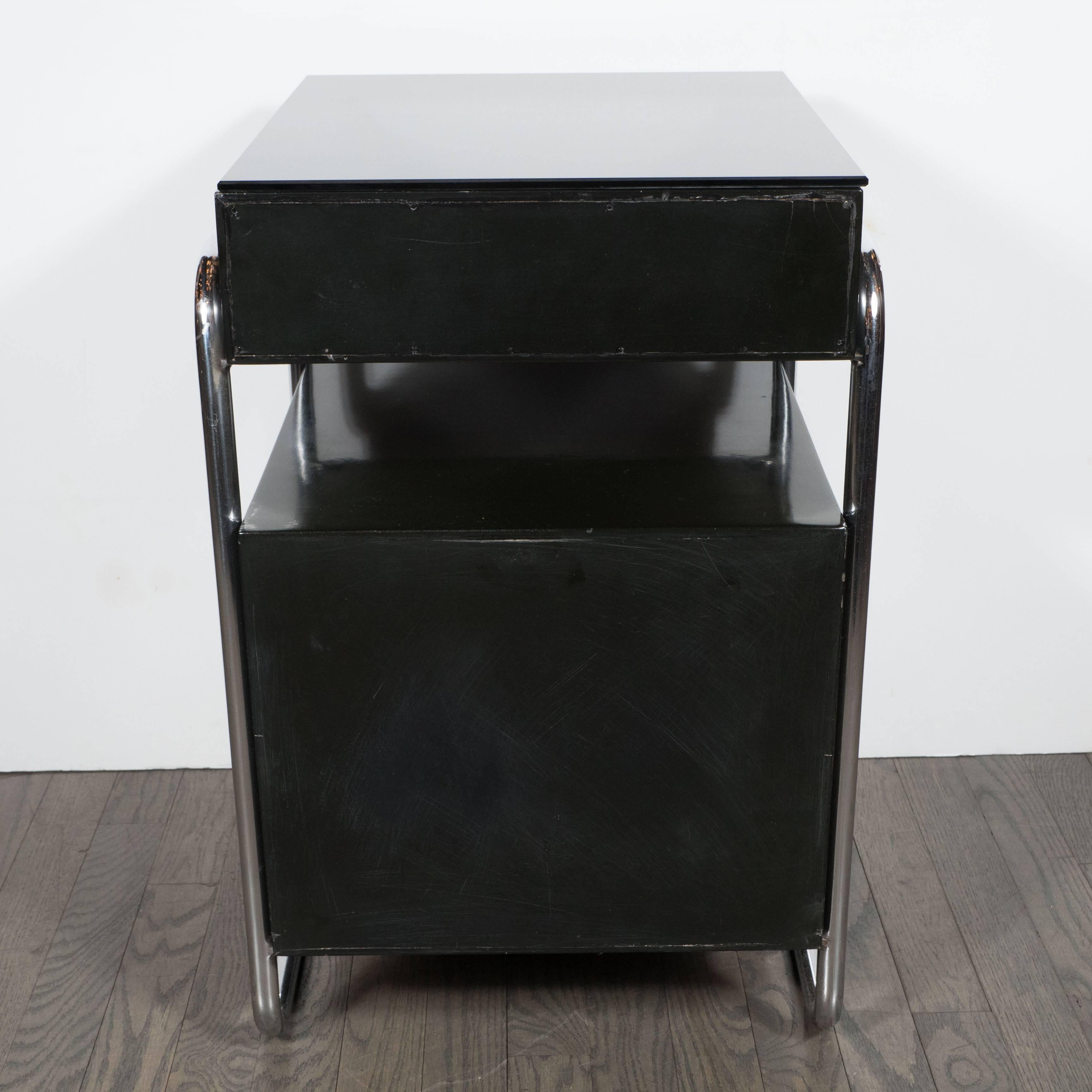 Pair of Art Deco Machine Age Nightstands in Black Lacquer by Wolfgang Hoffman In Excellent Condition In New York, NY