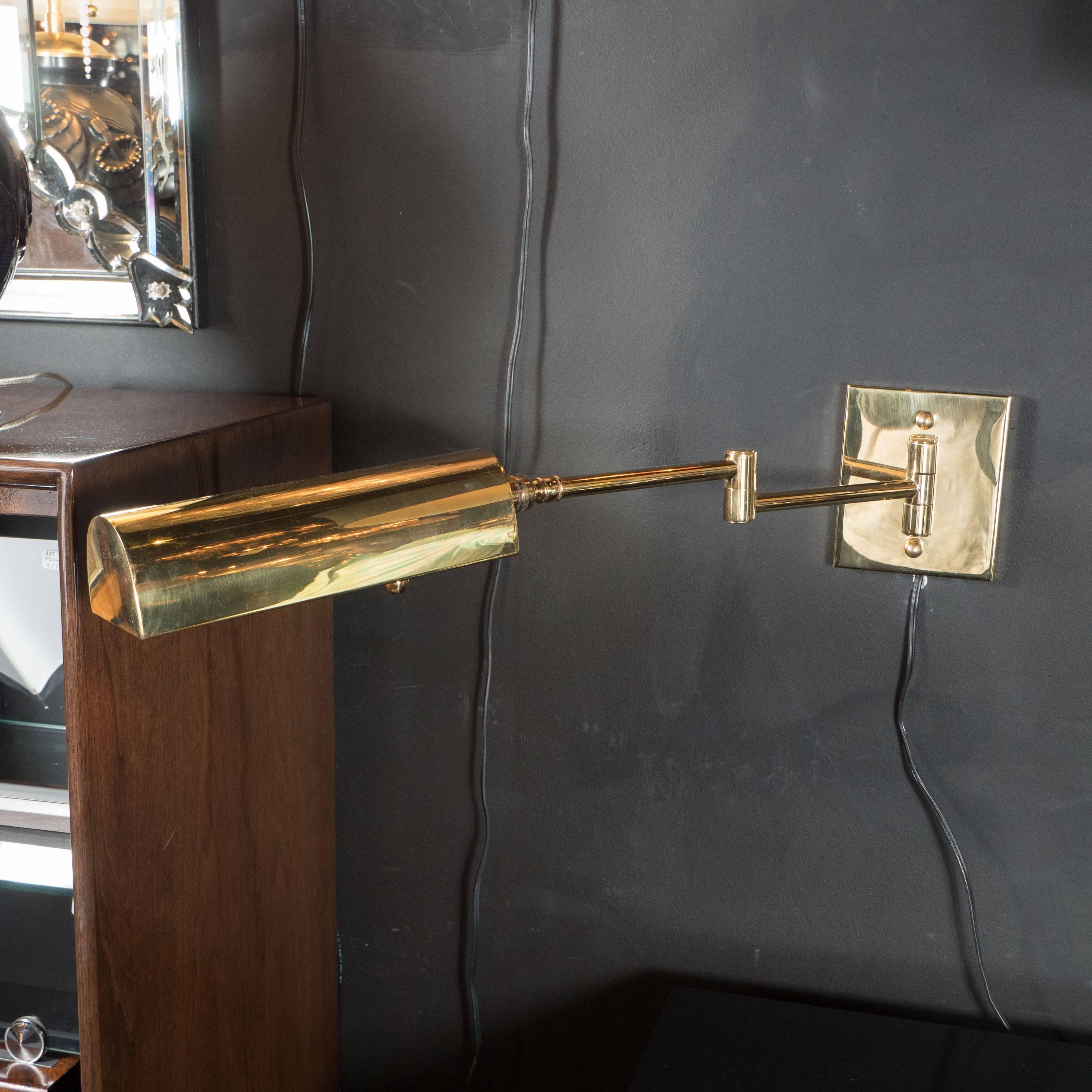 These very sleek and sophisticated sconces feature a swing arm design in high quality solid brass. The brass shade of the sconce pivots so one can adjust the light. They will blend beautifully with all decors. They retain there original Boyd