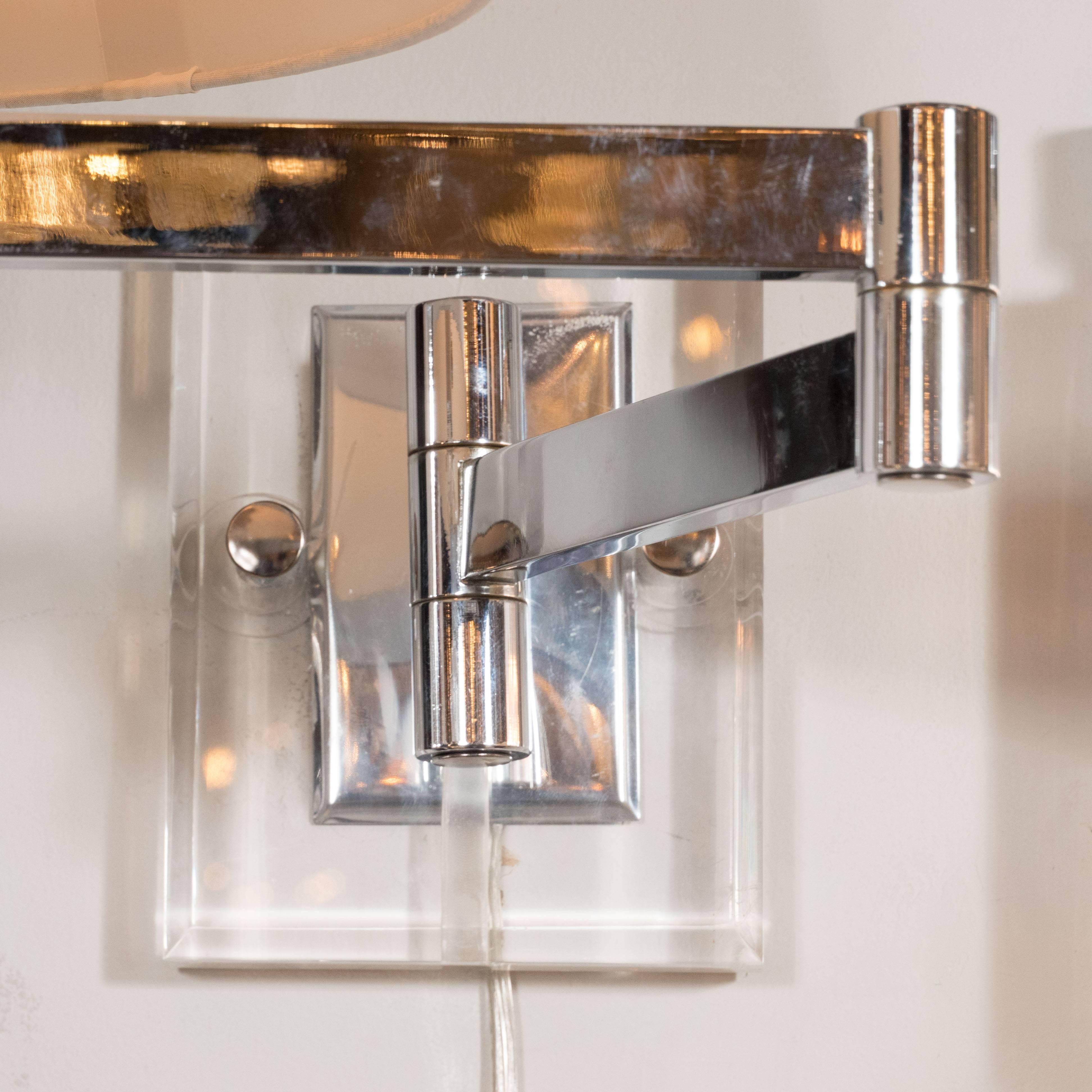 Ultra Chic Mid-Century Adjustable Swing-Arm Sconces in Chrome and Lucite In Excellent Condition In New York, NY