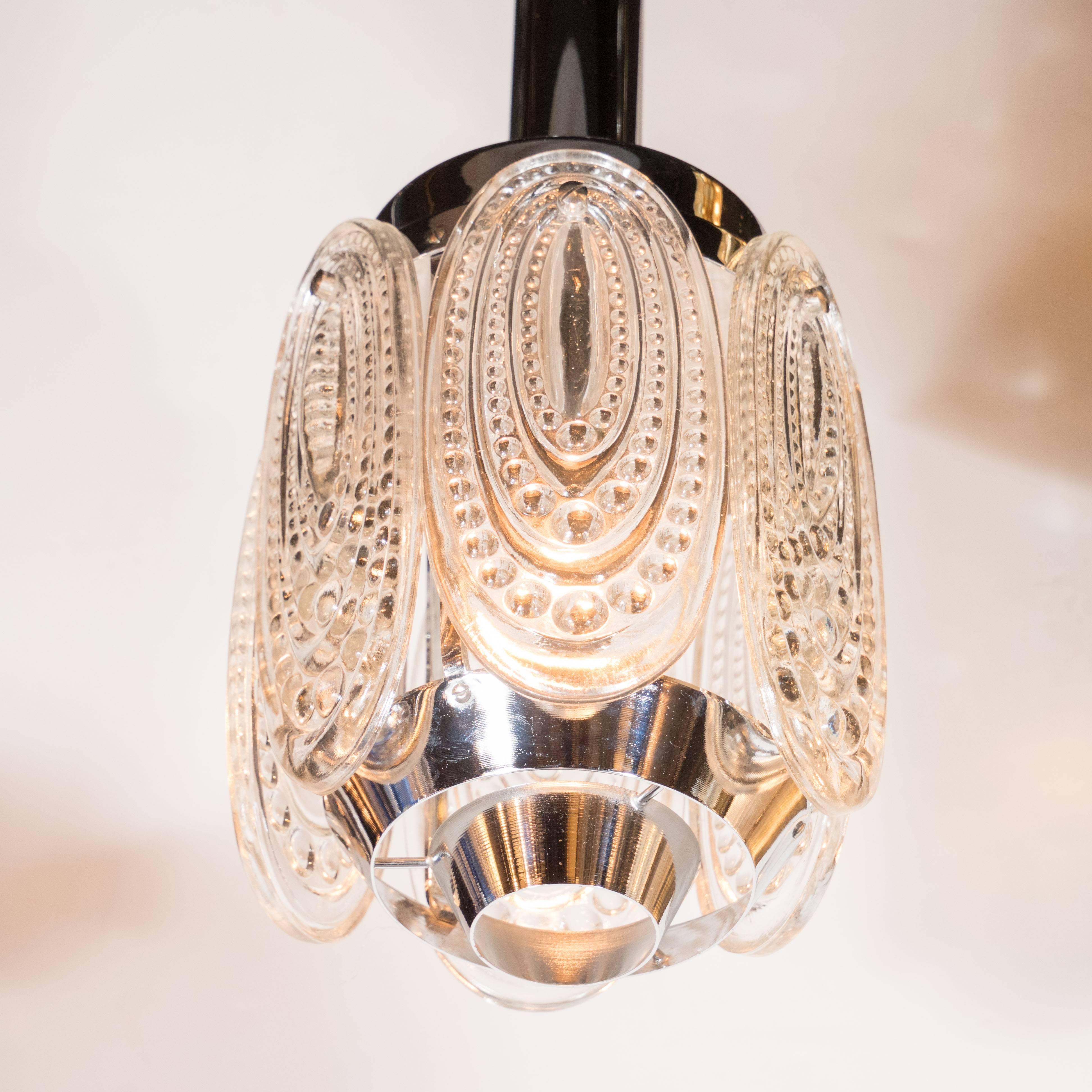 Polished Mid-Century Modernist Pendant in Nickel with Patterned Pressed Glass Oval Discs