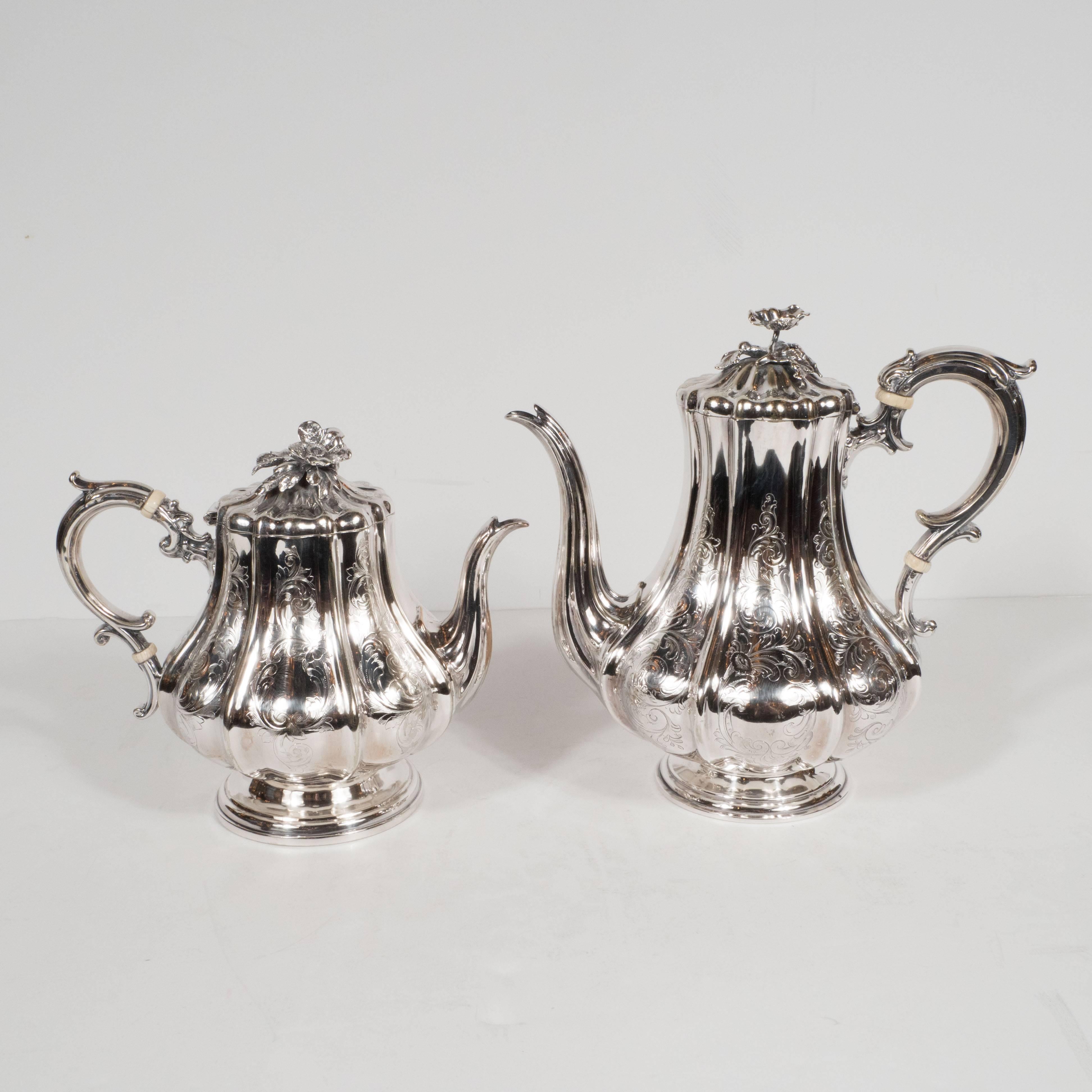 This lustrous six piece coffee/tea service was created circa 1950 by the legendary silversmiths Elkington 
Co of Birmingham England. It includes a tray, a samovar, a coffee and tea pot, a sugar bowl, and a cream saucer. While each piece in the