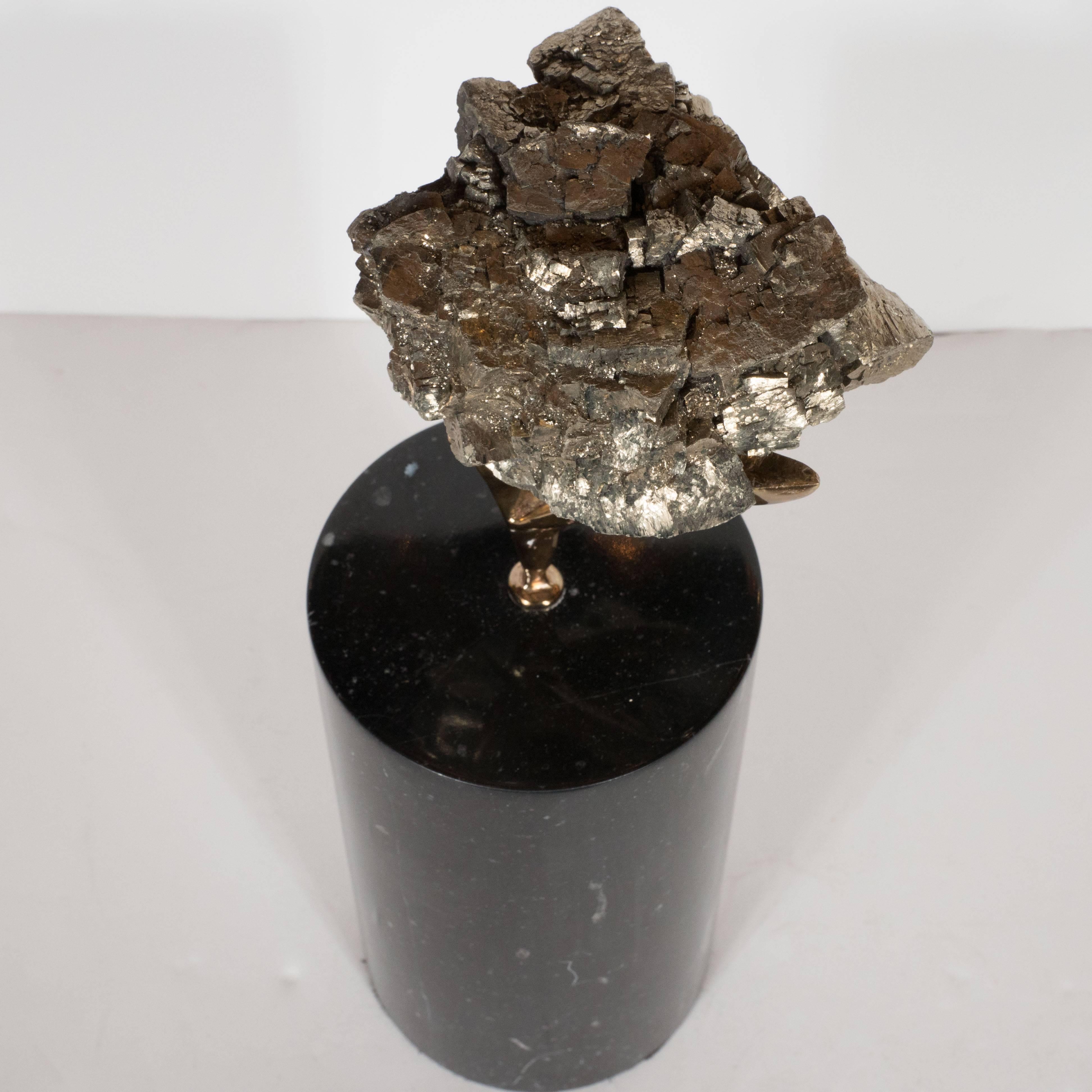 Pyrite Specimen in a Sculptural Bronze Cradle Attached to a Black Marble Base 1