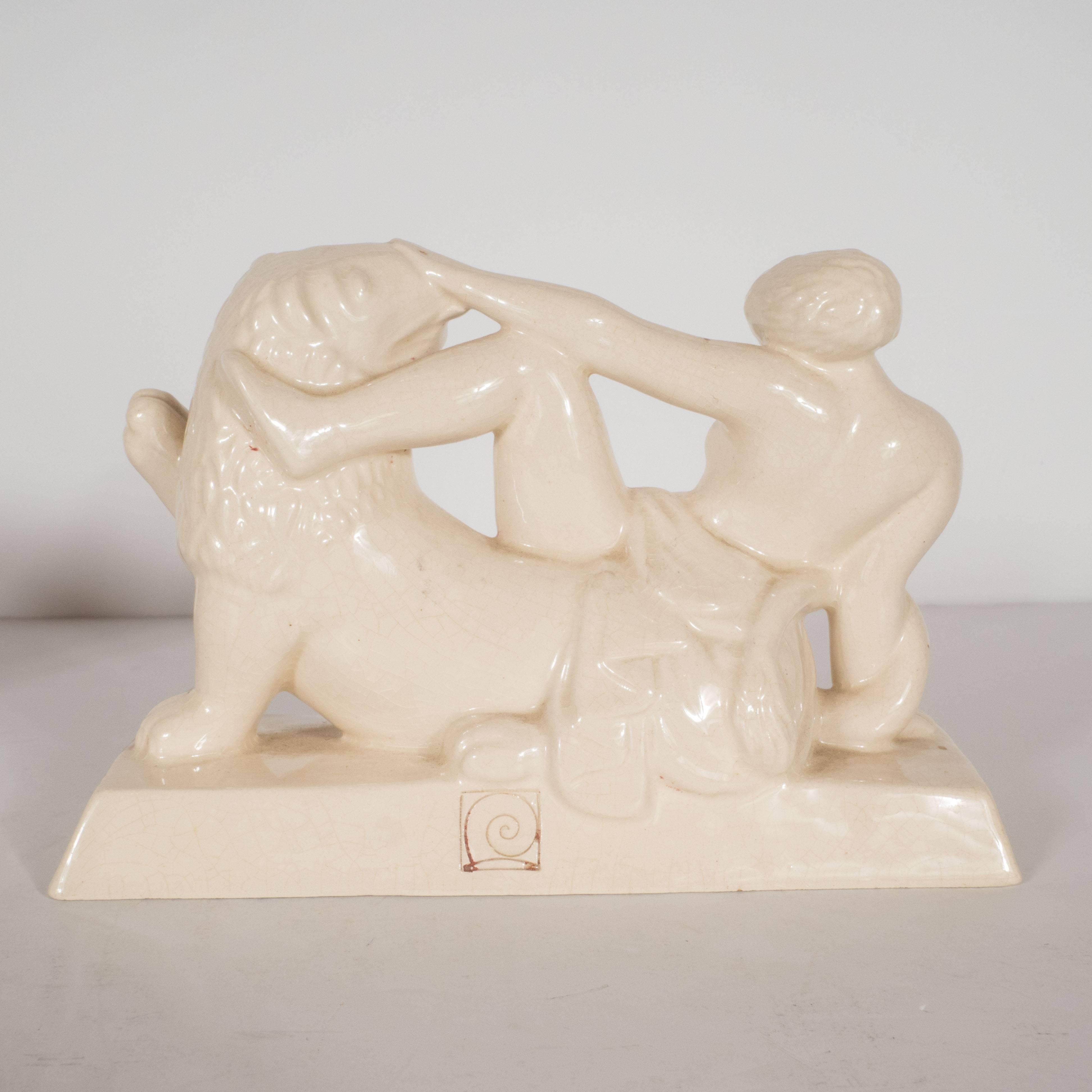 Art Deco Ceramic Book Ends Featuring Lion and Nude Female Figure In Excellent Condition For Sale In New York, NY