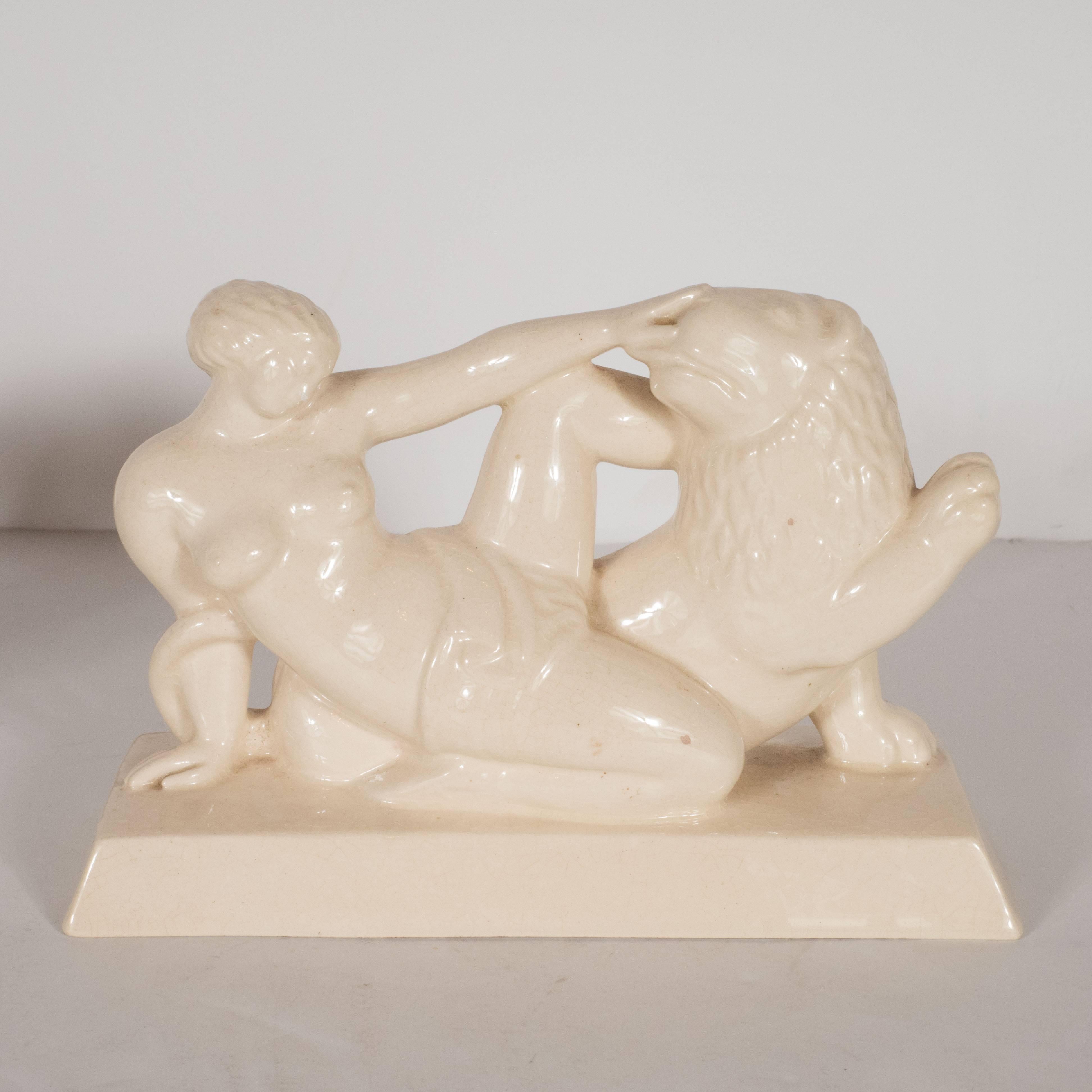 Glazed Art Deco Ceramic Book Ends Featuring Lion and Nude Female Figure For Sale