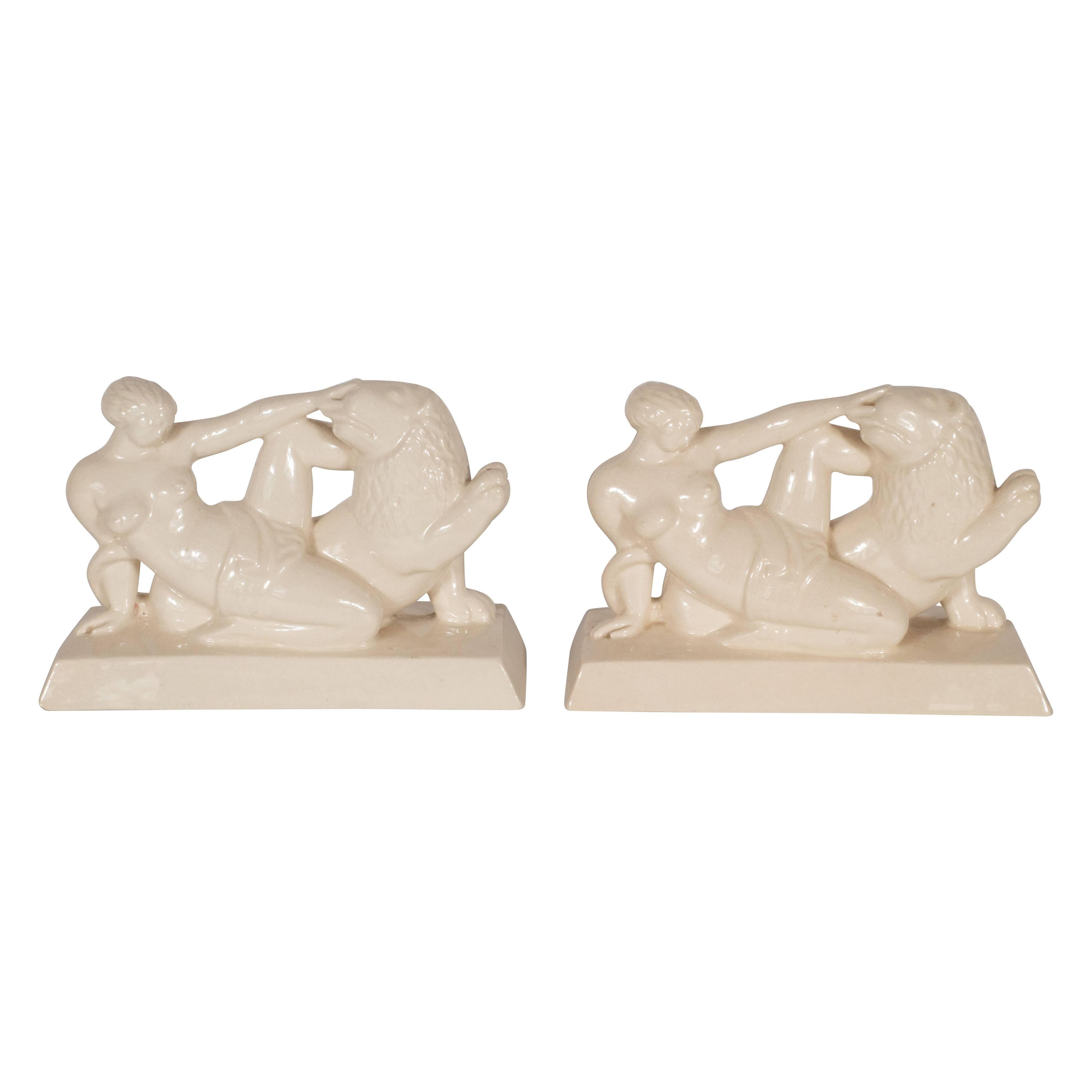 Art Deco Ceramic Book Ends Featuring Lion and Nude Female Figure For Sale