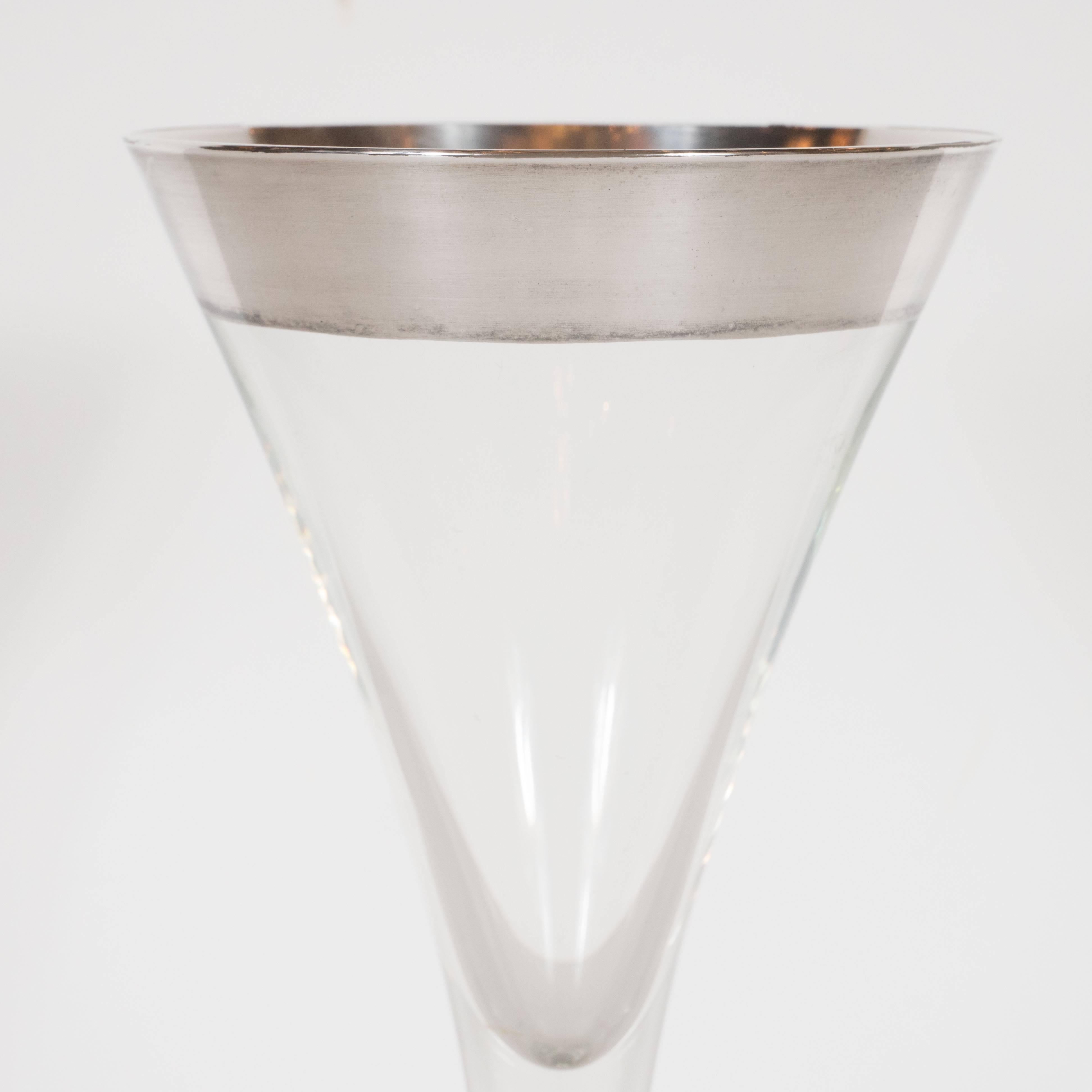 These sophisticated martini /wine glasses were created by Dorothy Thorpe, the acclaimed Mid-Century glassware designer, in the 1950s. Their understated elegance helps to explain her renown. They are perfect for any occasion, be it a casual after