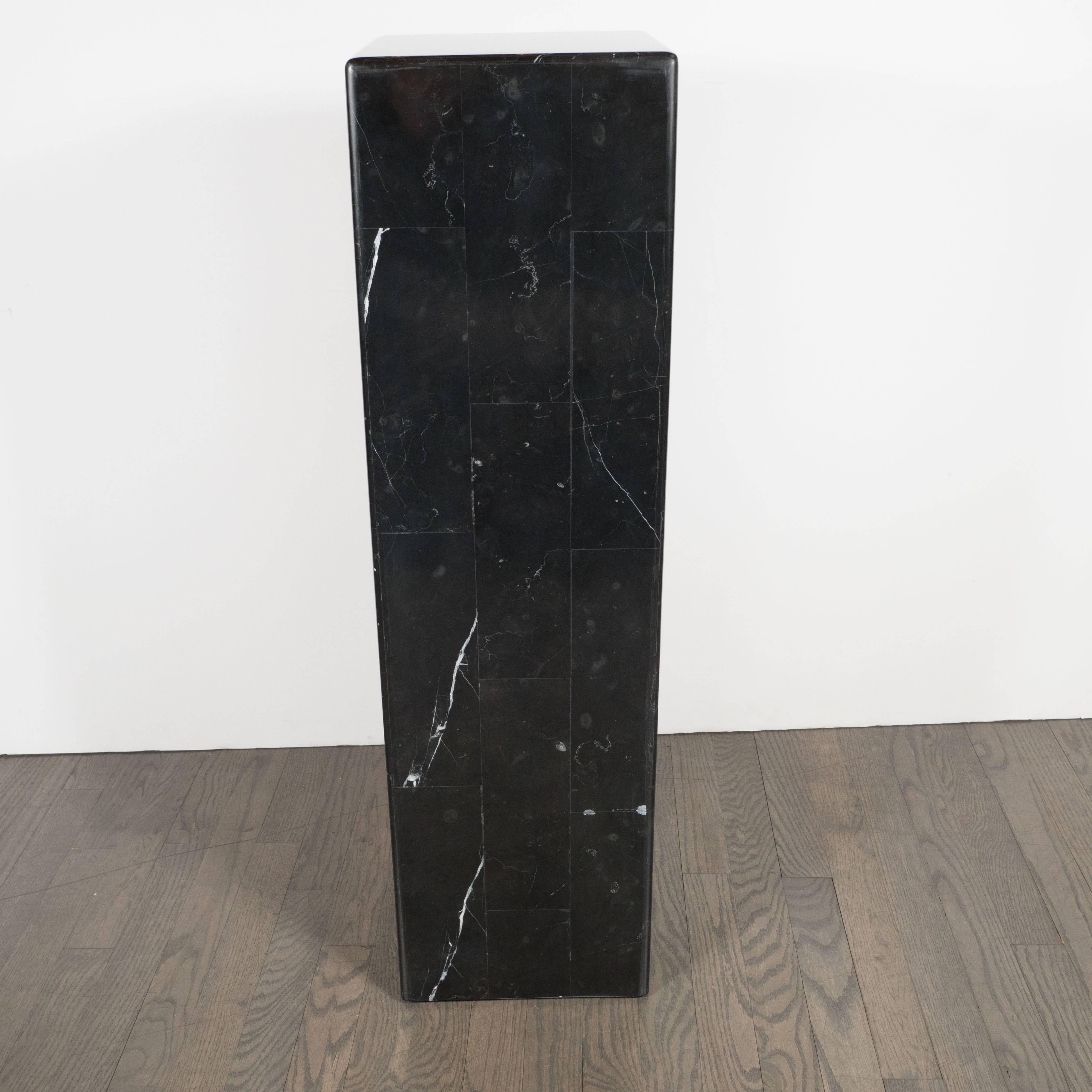 black marble pedestal