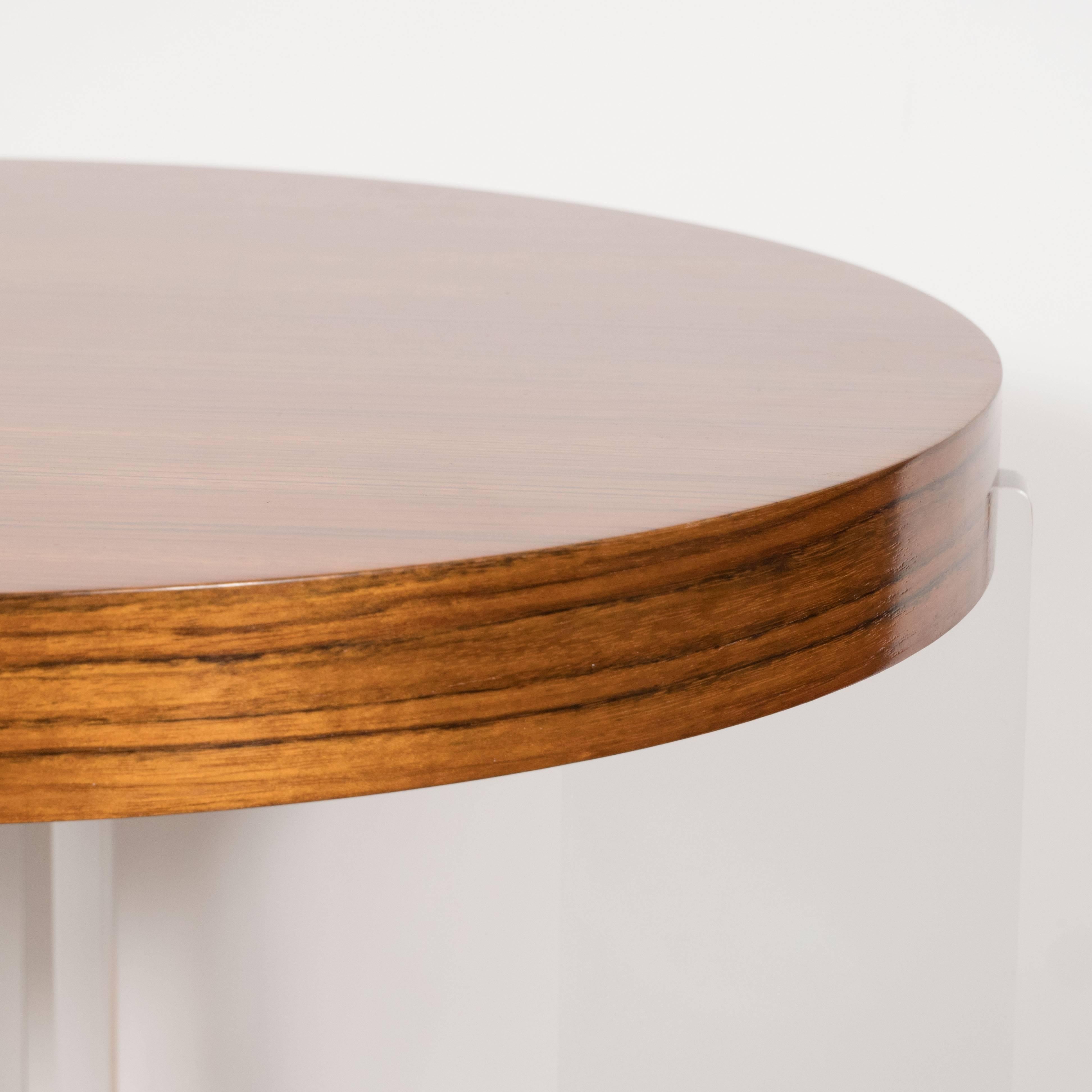 Vanguard Circular Table in Bookmatched Mozambique with Lucite Supports 1