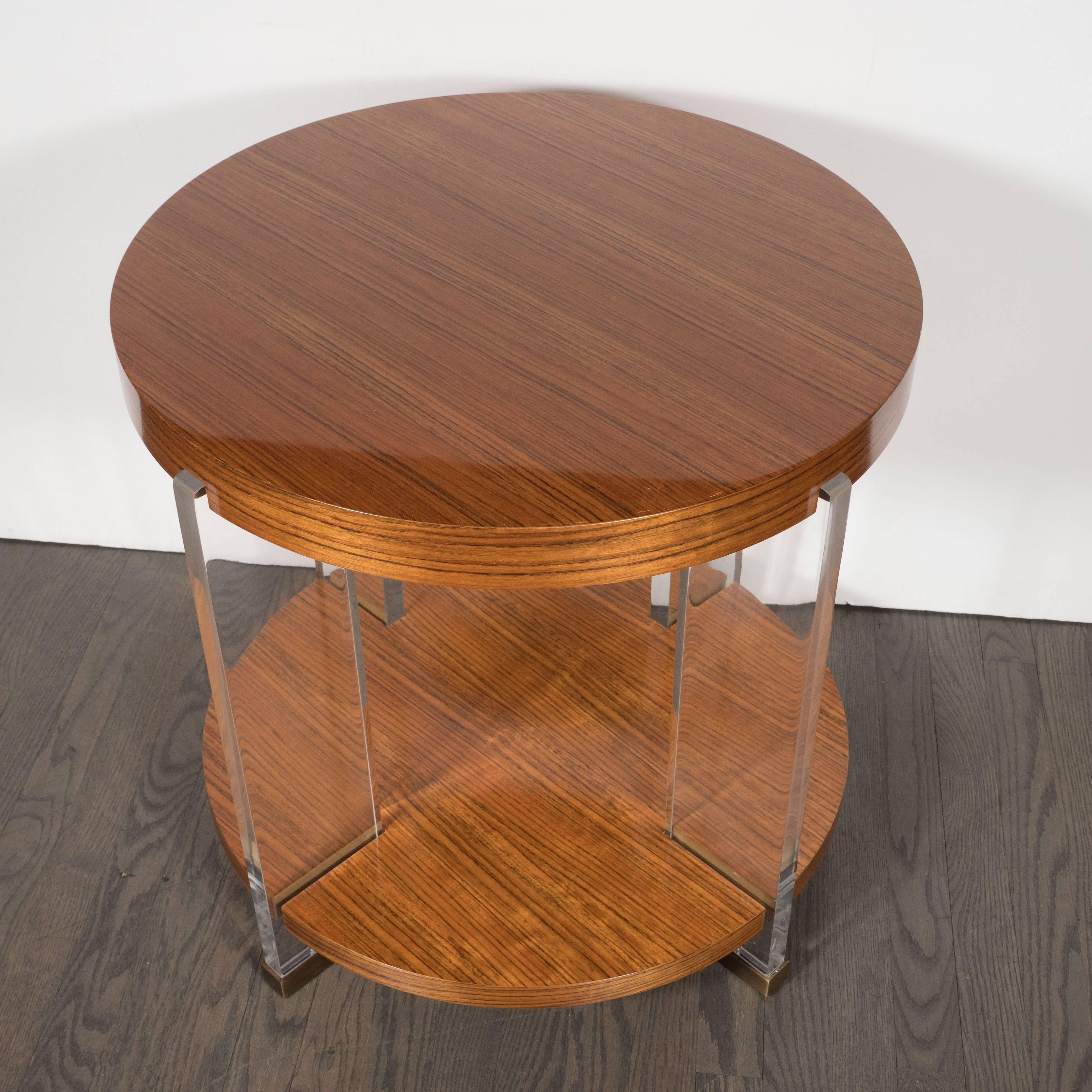 Vanguard Circular Table in Bookmatched Mozambique with Lucite Supports 2