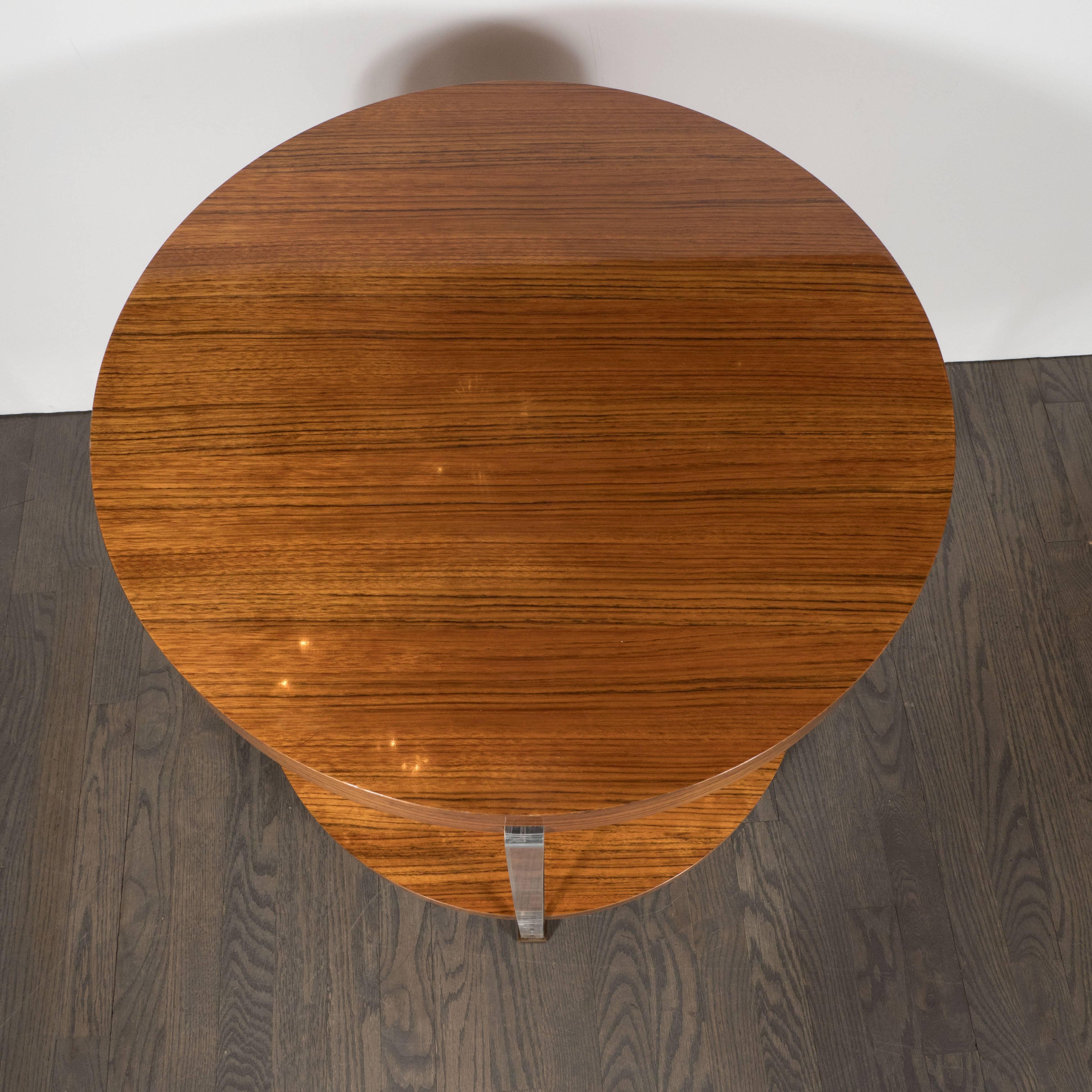 Vanguard Circular Table in Bookmatched Mozambique with Lucite Supports 3