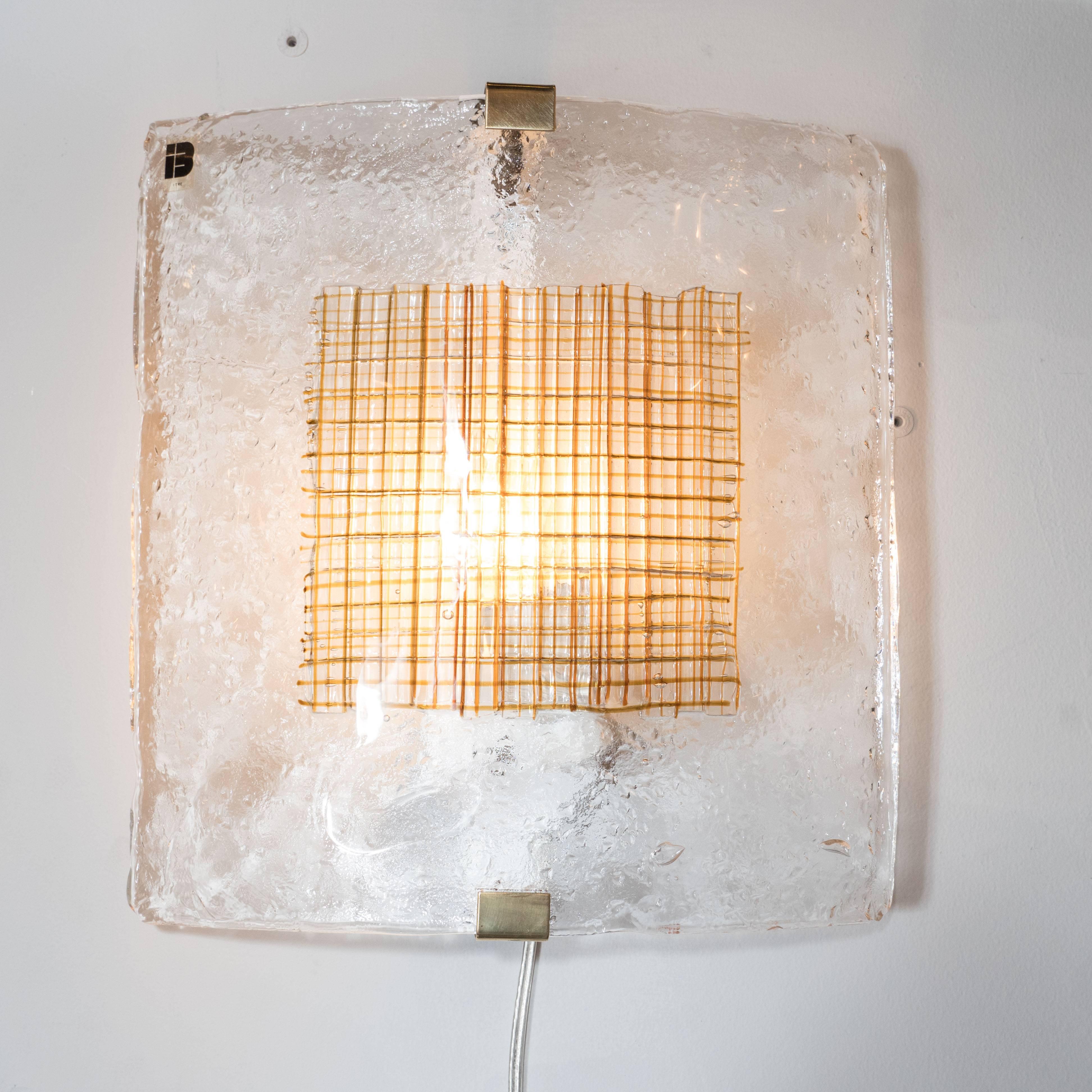 This stunning pair of Mid-Century Modernist wall sconces were handblown by renowned studio 