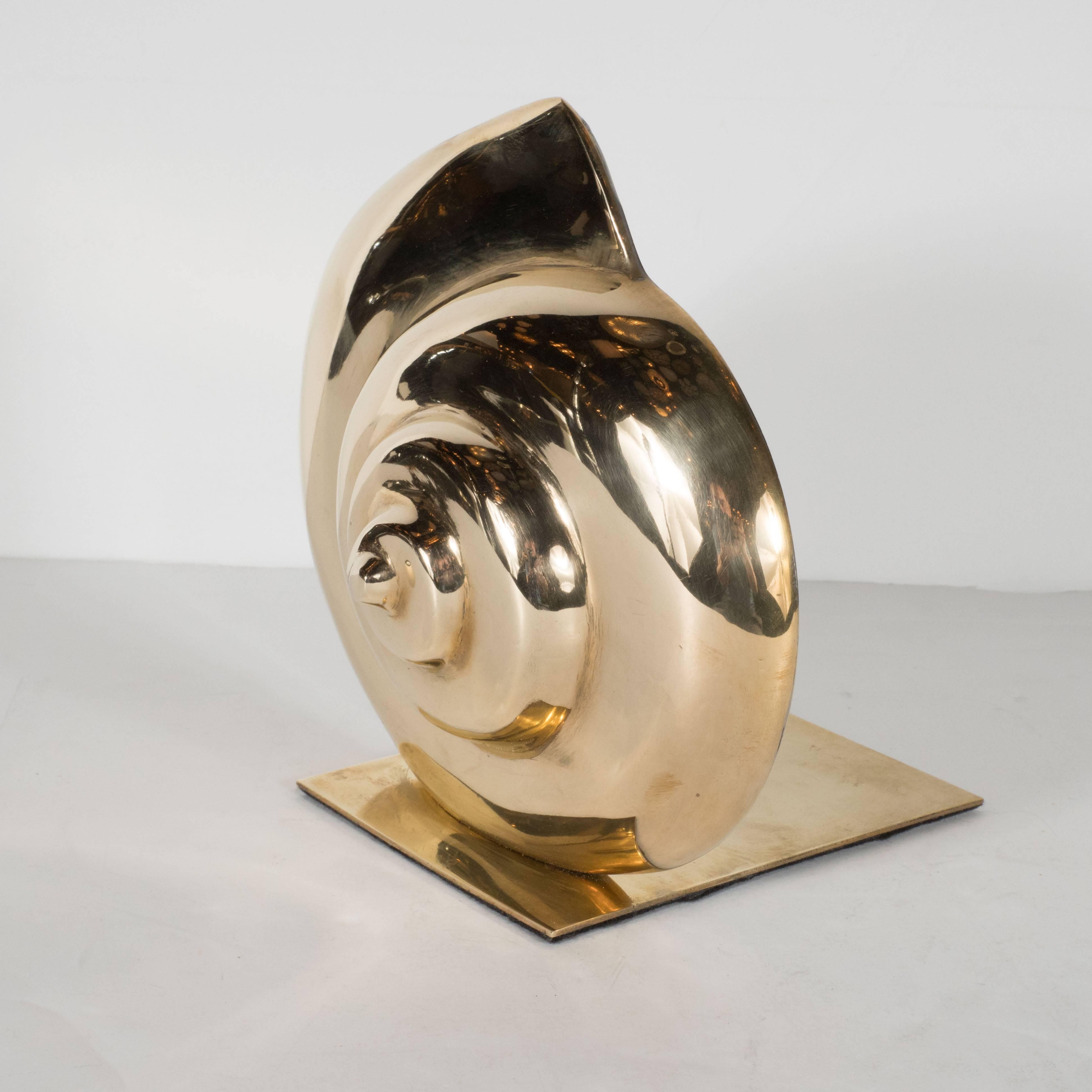 American Mid-Century Modernist Pair of Nautilus Shell Bookends in Lustrous Brass