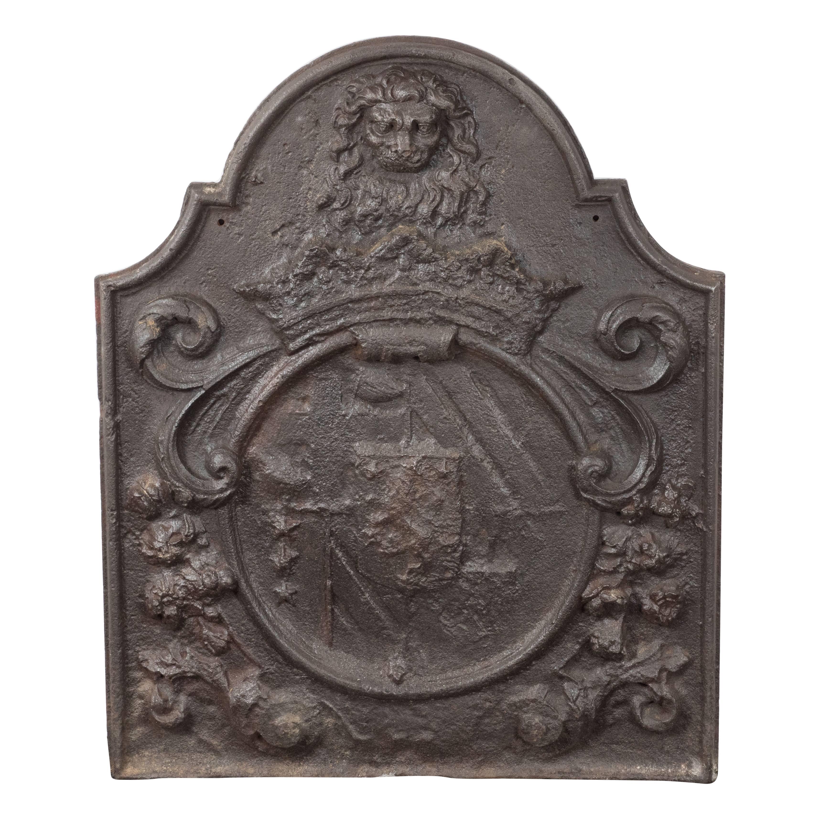 Dutch Armorial Fireback with Lion's Head Motif and Crest on Arch Top Panel