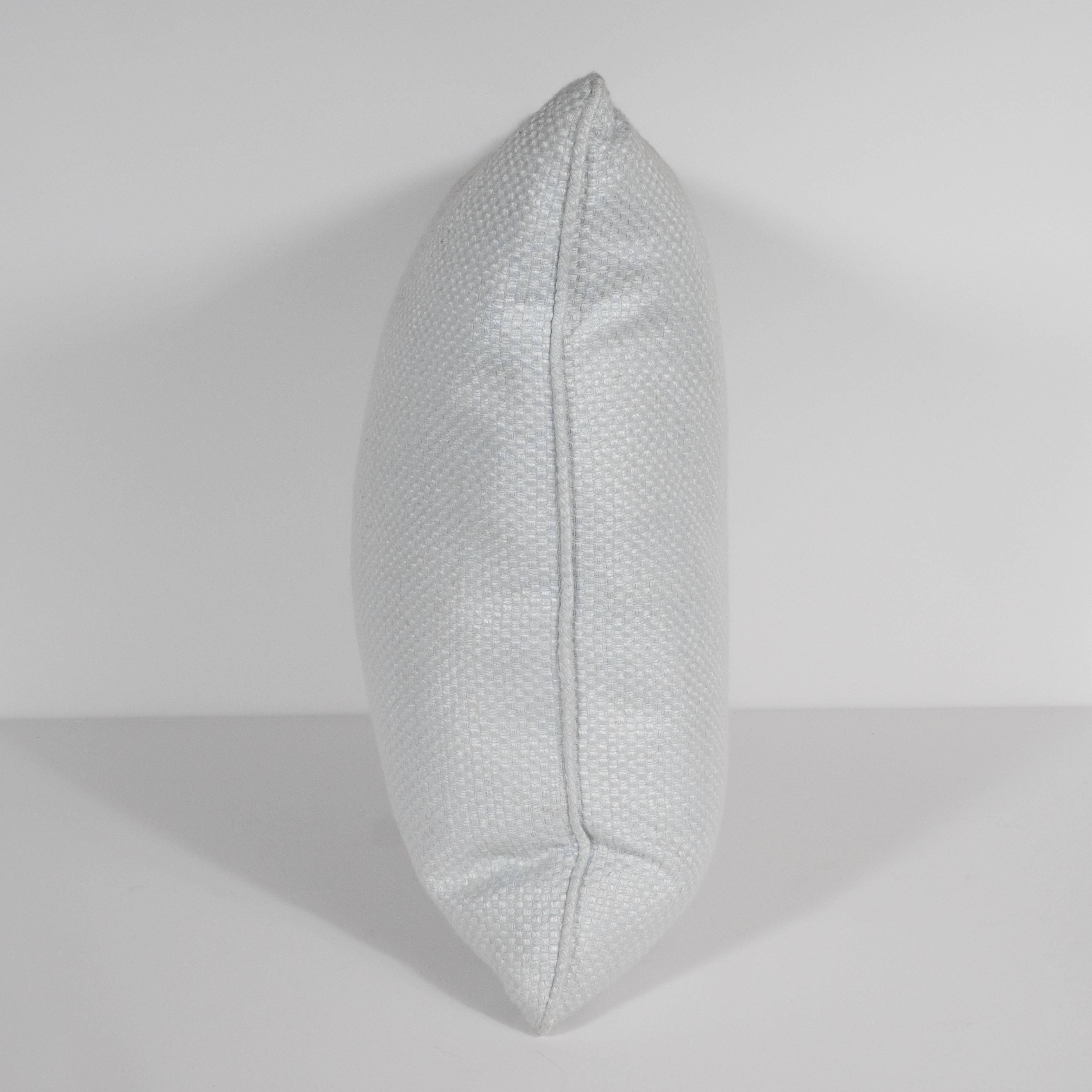 This gorgeous pair of pillows has been fabricated, in the United States, from luxurious white gold silk sourced from Il Bel Paese, Italy. They offer a subtle geometric pattern featuring contrasting horizontal and vertical grains, as well as piping