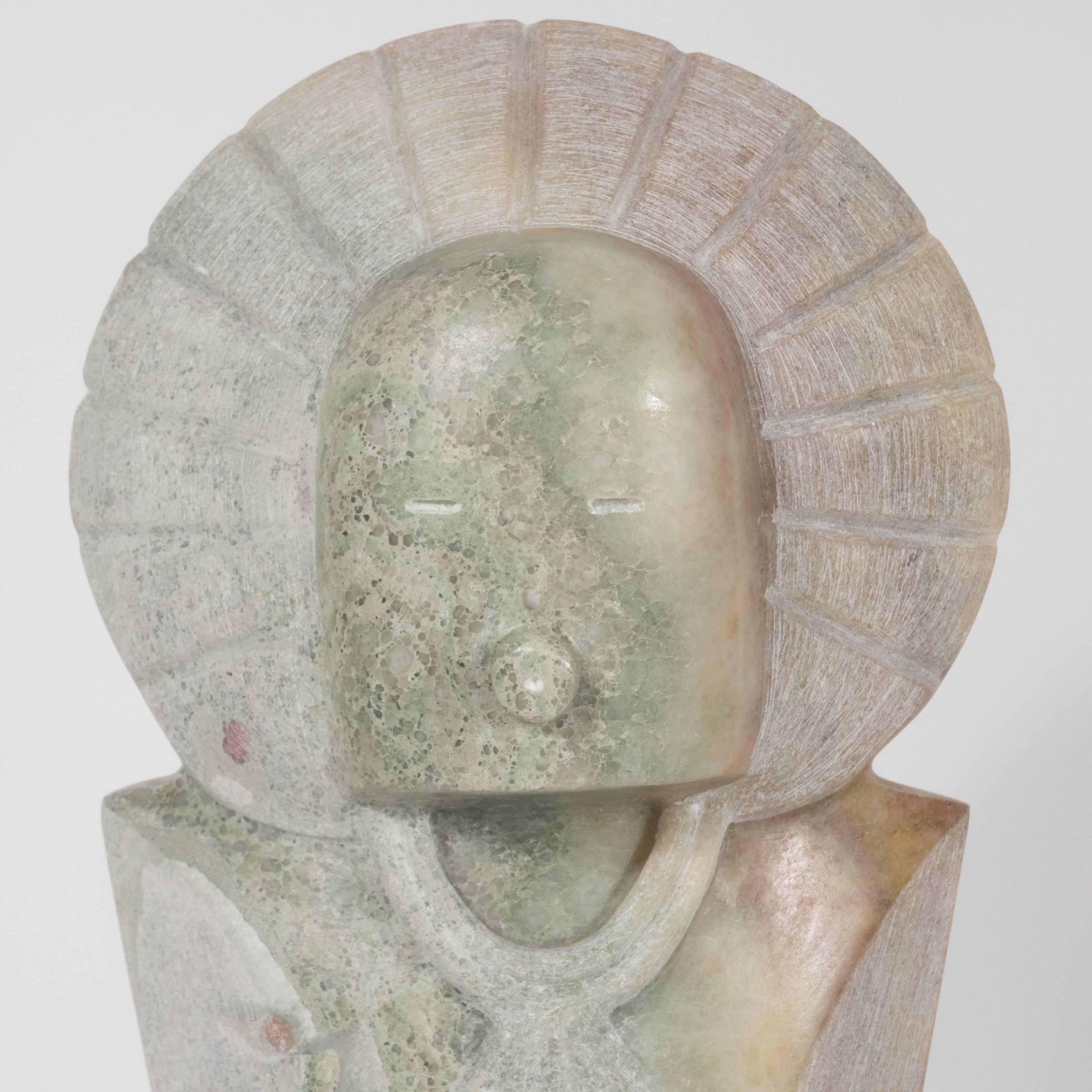 This sophisticated modernist sculpture was realized by acclaimed Southwestern sculptor R.D. Tsosie, whose work is represented in many esteemed public and private collections throughout the world, including at the Santa Fe state capitol. This piece