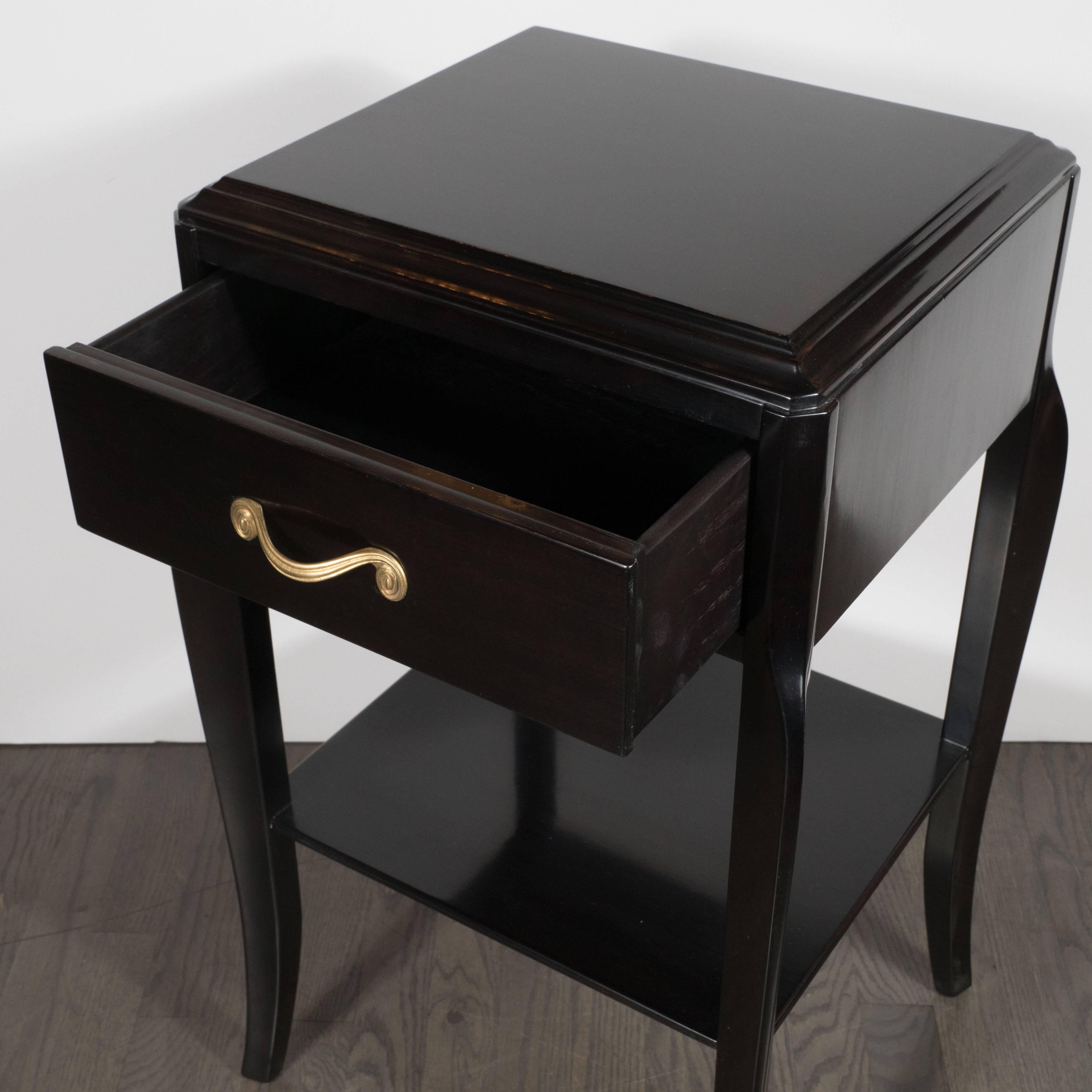 Gilt Pair of Grosfeld House Nightstands in Ebonized Mahogany with Gilded Scroll Pulls