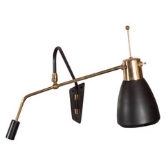 Italian Mid-Century Modern Swing Arm Wall Sconce in Brass and Black Enamel