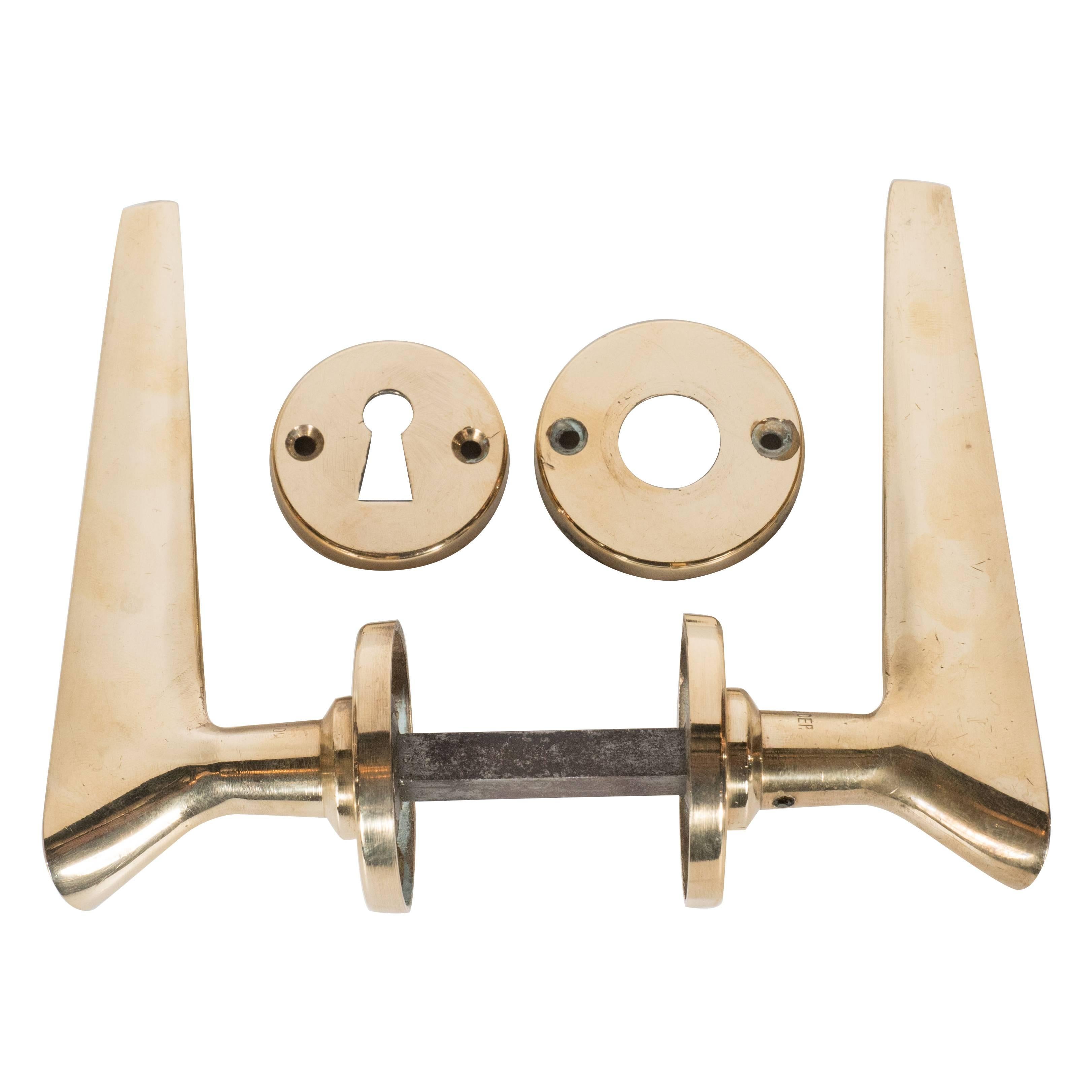 Sourced from a midcentury hotel in San MarCo, Venice, this stunning set of brass door handles were hand produced, in the manner of Gio Ponti, in Italy, circa 1950. They offer the sophisticated modern forms and clean lines that enthusiasts of