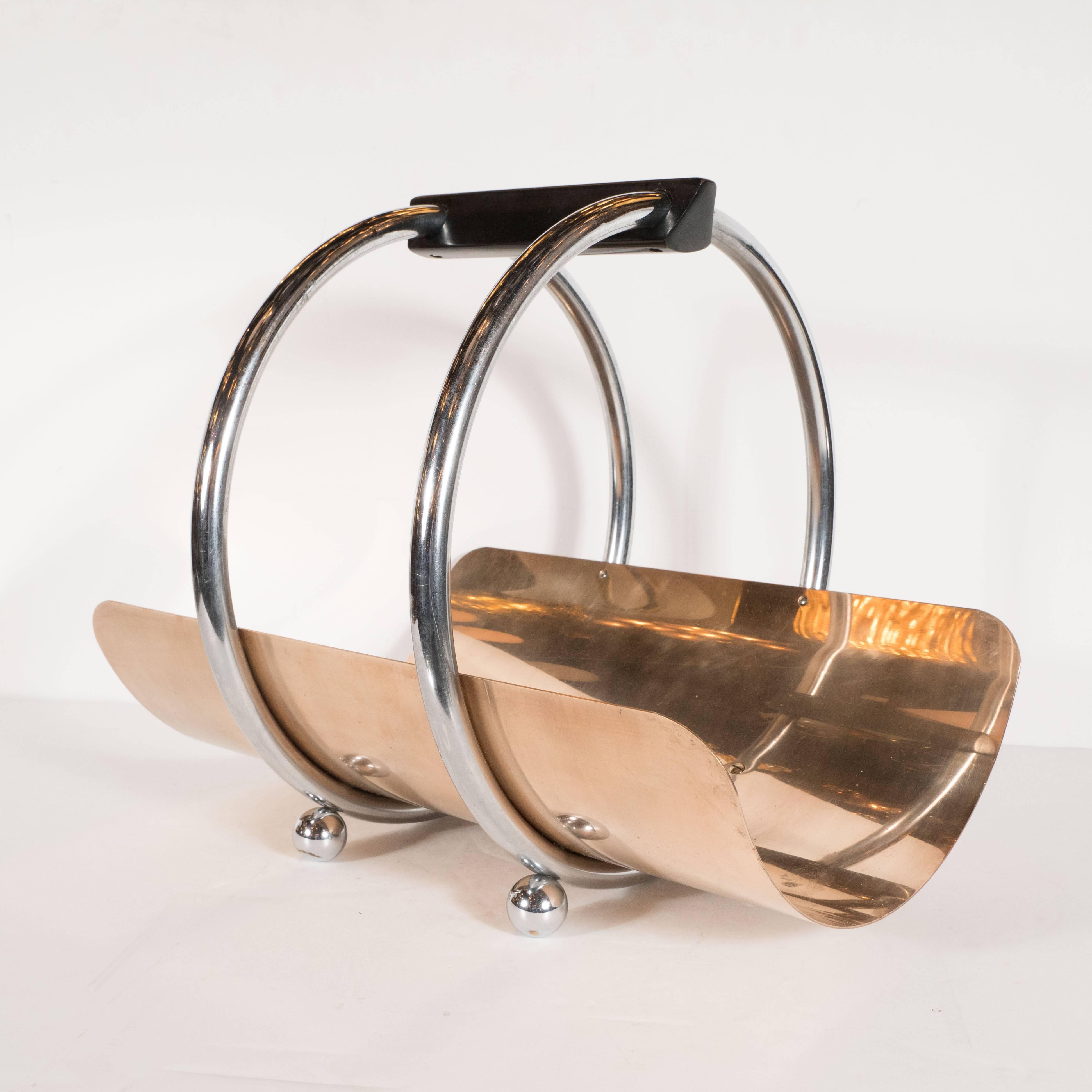 This iconic American streamlined Machine Age Art Deco design- often misattributed to Norman Bel Geddes- was designed by Leslie Beaton for the Revere Copper and Chrome Company, circa 1935. The belly of the holder is composed of a curved sheet of