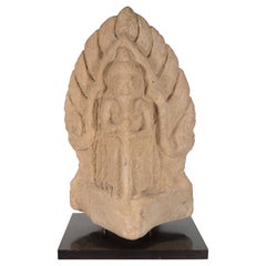 Antique Indian Hand-Carved Limestone Temple God with Lotus Leaf Motif